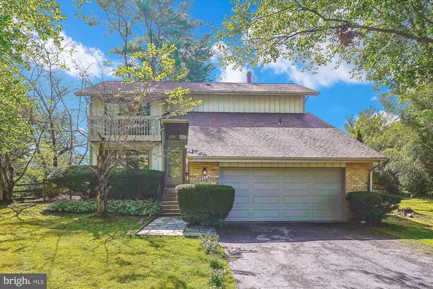 Don't miss out on this beautiful, sun-filled contemporary home tucked away on a quiet cul-de-sac with a private, fenced backyard. Step into the dramatic two-story foyer, flanked by formal living and dining rooms on one side and a versatile main-level office or fifth bedroom and powder room on the other. The updated kitchen features stainless steel appliances, a separate pantry, and a peninsula with extra seating space, opening seamlessly to the spacious family room with a cozy wood-burning fireplace and two oversized sliding glass doors leading to the rear patio. Upstairs, gleaming hardwood floors span the entire level, showcasing the impressive primary suite with a private balcony, professionally designed walk-in closet system, an additional closet, and a tastefully renovated bathroom with a wide vanity, walk-in shower, and stylish tile finishes. Three generously sized bedrooms and another full bathroom complete the upper level. The finished lower level offers a freshly painted recreation room with new carpet—perfect for a home theater—plus a large laundry area, utility room, and plenty of storage. Additional highlights include a two-car attached garage with convenient access through to the kitchen, a rear patio expanding the entire rear of the home overlooking a park-like fenced yard with exceptional privacy, and recent updates including a new roof and hot water heater (both just 3 years old). The Montgomery Village community offers 6 pools, basketball courts, pickle ball court, tennis courts, dog park, soccer fields and playgrounds.