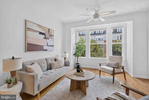 Photo of 2665 Prosperity Avenue #318, FAIRFAX, VA 22031 (MLS # VAFX2334928)