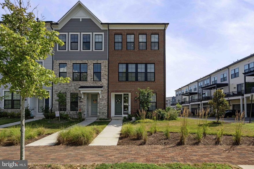 New price for this exquisite 3-Year-Young Brick Front End Unit Townhouse in the Prestigious Belmont Bay Community.
Welcome to this magnificent, modern townhouse located in the exclusive waterfront community of Belmont Bay on the serene Occoquan River, just a short boat ride to the Potomac River. This home is a true gem, showcasing high-end upgrades and a meticulously designed layout that combines luxury and comfort.
Main Level:
Step into the bright and airy main level, where the gourmet kitchen takes center stage. Outfitted with top-of-the-line stainless steel appliances, quartz countertops, a large center island, and custom cabinetry, this kitchen is a chef’s dream. The open-concept design flows seamlessly into the spacious family room, perfect for both everyday living and entertaining. A conveniently located half bath completes this level.
Upper Level:
Ascend to the upper level, where you’ll find the lavish owner’s suite. This private retreat features a luxurious bath with dual vanities and spa shower, and a large walk-in closet. An additional well-appointed bedroom and a full bath provide comfort and convenience for family or guests. The thoughtfully placed laundry room on this level adds to the home’s practicality.
Lower Level:
The lower level offers versatile space that includes a third bedroom and another full bath, ideal for guests, a home office, or a recreational area. This level ensures privacy and flexibility to suit your lifestyle needs.
Outdoor Living:
Step outside to enjoy the expansive composite deck, perfect for alfresco dining, relaxing, or hosting gatherings. 
Additional Features:
Finished 2-car garage with ample storage space.
Access to Belmont Bay’s exceptional amenities, including waterfront walking trails, a marina, a pool, tennis courts, and a community center.
Proximity to the VRE station for easy commuting.
Convenient access to Interstate 95 and Route 1, making travel and commuting a breeze.
This exquisite townhouse is more than just a home; it’s a lifestyle. Experience the best of waterfront living with the convenience of nearby amenities and the luxury of a modern, well-appointed residence.