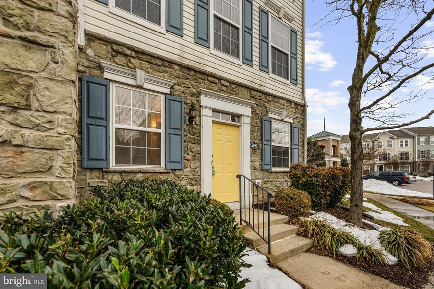 Welcome home! Nestled in the sought-after gated community of Parkside at Ashburn, this beautiful end-unit townhome offers the perfect blend of comfort, style, and convenience. Inside, the entry level welcomes you with a flexible bonus room ideal as a private home office or dedicated gym space. Hardwood floors carry you upstairs to the main level, where sophisticated crown molding and the abundance of natural light that only an end-unit home can offer set the tone in the elegant living room, anchored by a cozy fireplace with a striking surround - a perfect gathering space for any occasion. The open floor plan continues into the kitchen, where you'll find modern stainless steel appliances and sleek granite countertops. With a two-level island breakfast bar, the kitchen opens into the sunny dining room, making entertaining effortless. Upstairs, the generously sized primary suite features a large walk-in closet and a bright, spacious en suite, while the second bedroom offers a step-in closet and private full bath of its own. Convenient bedroom-level laundry adds everyday ease. Step outside from the kitchen onto your private balcony, a lovely retreat for morning coffee or evening relaxation. The rear-entry two-car garage provides secure, convenient parking. As a resident of this gated community, you'll enjoy access to an outdoor pool, playground, and tennis courts. Just minutes to Wegmans, Harris Teeter, One Loudoun, Loudoun Station, Trailside Park, Ashburn Recreation Center, and Dulles Airport. Quick access to the Dulles Toll Road, Fairfax County Parkway, I-495, Route 28, Route 7, and Ashburn Metro Station make commuting a breeze. Don't miss this exceptional opportunity - schedule your showing today!