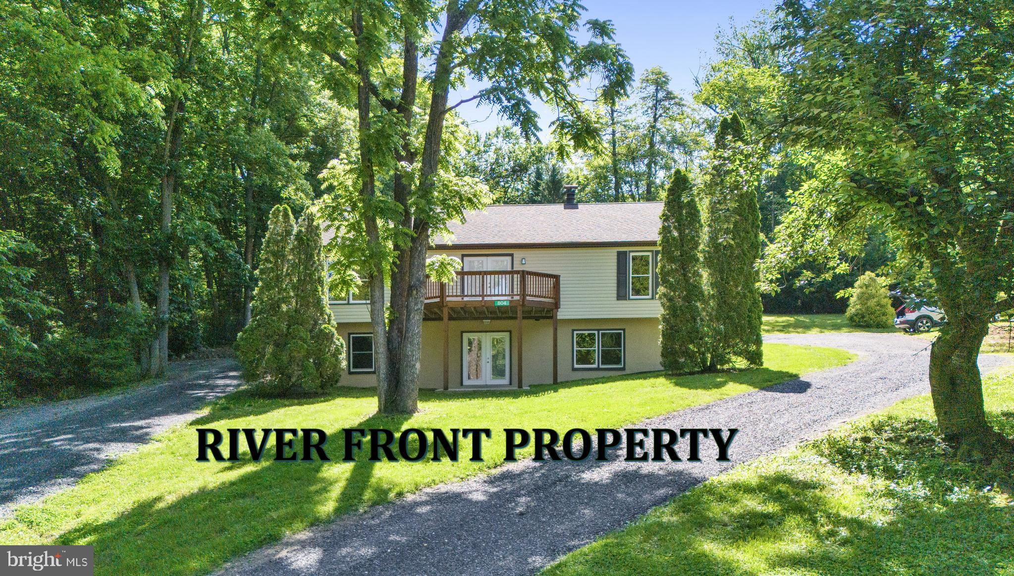 RARE OPPORTUNITY TO OWN A HOME AND PRIVATE RIVER LOT (TOTAL OF 2.49 ACRES) ON THE SHENANDOAH RIVER, HOME IS NOT IN FLOOD ZONE!! THIS HOME OFFERS 3 BED ROOM 2 BATHS ON MAIN LEVEL, WITH HAND SCRAPED OAK FLOORS IN LIVING ROOM AND PRIMARY BEDROOM AND PRIMARY CLOSET. NEWER LVP ADORES THE REST OF THE FLOORS. THE FAMILY ROOM OFFERS A WOOD BURNING FIREPLACE AND A DECK WITH RIVER VIEWS. SELLER HAS RECENTLY REMODELED- HEAT PUMP AND GAS FURNACE IS APPROX 2 YRS OLD, FRESH PAINT ALL OVER, NEW DECK ON REAR- STAINED, KITCHEN OFFERS GAS RANGE AND GRANITE COUNTER TOPS, STAINLESS STEEL APPLIANCES, THE BASEMENT OFFERS A FINISHED OFFICE/FLEX SPACE, FAMILY ROOM WITH WOOD STOVE, UNFINISHED AREA FOR STORAGE. THE PRIVATE RIVER FRONT LOT OFFERS ITS OWN WATER SUPPLY- FROST FREE HYDRANT, ITS OWN ELECTRIC POLE WITH SEPARATE METER AND POTENTIAL FOR INCOME. THE GARAGE OFFERS-960 SQ FT, 14' TALL,
GARAGE DOOR, 2 CAR, ROUGH IN FOR BATH, LOFT, INSULATED, PLYWOOD WALLS AND FINISHED FLOORS. GREAT LOCATION FOR AN AIRBNB.