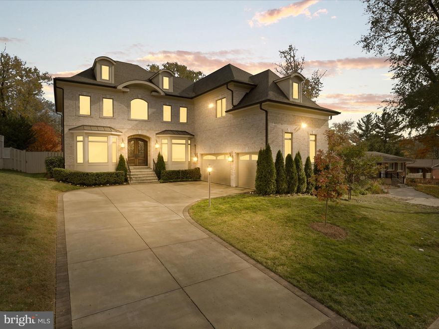 This superbly crafted custom home provides for both gracious entertaining and convenient family living, all in the heart of McLean!  Light & bright, with an open flowing floor plan, volume ceilings, beautiful moldings and superior craftmanship in every space.  The kitchen is a chef’s delight, appointed with professional grade appliances including a Wolf range and hood.  Designer fixtures include stainless farm sink, stainless undermount island sink and wall mounted pot filler (Culligan water softener and filter, Culligan filtered water in kitchen).  Quartz countertops form an oversized island w plenty of seating.  The kitchen is open to the breakfast nook, the sunroom and the spacious family room, accented by coffered ceilings. Double doors lead into private first floor office.  The five large sized bedrooms on the upper level all have baths ensuite.  Expansive Primary Suite is well appointed with tray ceilings, coffee bar, fireplace, private balcony, three walk-in closets, and luxury bath with soaking tub, separate vanities, and walk-in glass enclosed shower with room for two. Fully finished walk-out lower level with two additional bedrooms, spacious recreation areas w fireplace, custom wet bar, wine cellar with new cooling unit, exercise room, sauna and Bose theatre room with recliner seating for eight (seating conveys).  Molded brick exterior, solid wood double entry doors, oversized 3-car garage, fenced in back yard with flat play areas, children’s play structure, and spacious deck. Turn-key ready for immediate occupancy!
