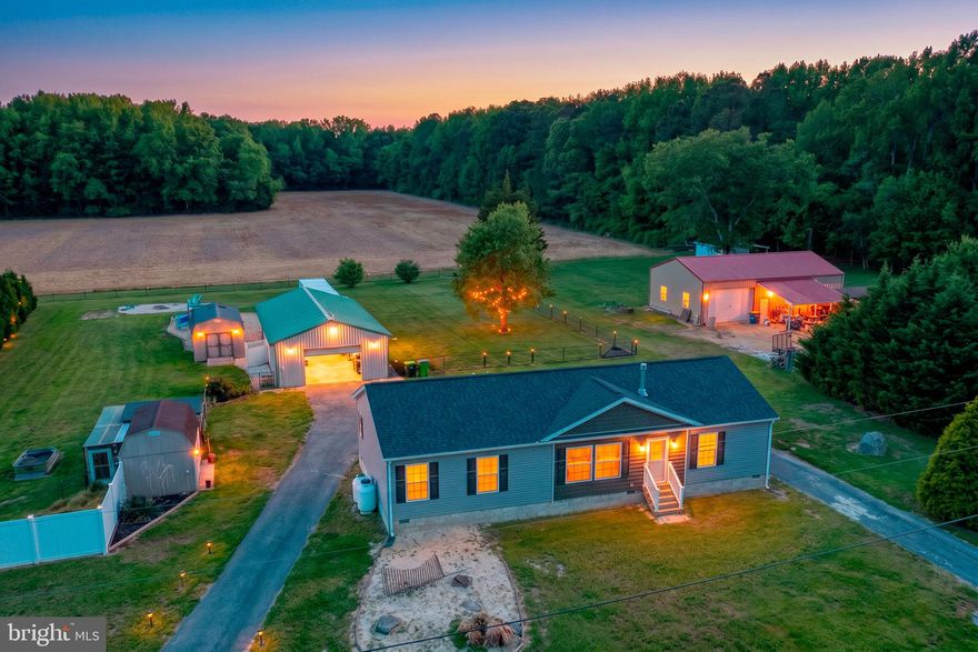 Welcome to 430 Scotts Corner Road in Milford, Delaware — a brand-new, never-lived-in ranch-style manufactured home set on 1.34 acres in a peaceful rural setting. Built in 2025, this move-in-ready home offers approximately 1,568 square feet of comfortable one-level living with 2 bedrooms, 2 full bathrooms, and a spacious office/study that provides flexibility for guests, remote work, or a hobby room.

Inside, everything is fresh, clean, and ready for its first owner. The home features a bright combination kitchen and living area, kitchen island, pantry, recessed lighting, walk-in closet space, and convenient main-floor laundry. Additional features include central air, forced-air/heat pump heating, well water, and LPP septic.

Step outside and enjoy the space, privacy, and possibilities this property offers. The level lot includes attractive landscaping, stone beds, a fire pit area, fenced above-ground pool, asphalt driveway, and ample off-street parking. A major highlight is the 24x48 pole barn equipped with electric, water, and heat, plus an attached large storage container — ideal for storage, equipment, hobbies, workshop use, or business needs.

Located outside city limits, this property delivers the quiet country lifestyle buyers want while keeping everyday conveniences close by. You’re just a short drive from Route 1, shopping, Milford amenities, and Delaware beaches.

430 Scotts Corner Road offers brand-new, never-lived-in living, usable acreage, valuable outbuilding space, and a convenient coastal Delaware location — schedule your private showing today.