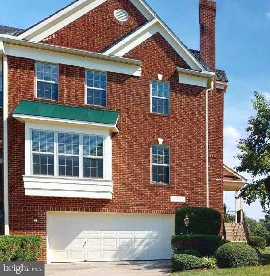 IT’S BACK...with SUPER improved everything; including PRICE!  You will love this GEM if you have the following priorities: location, space, value, and quality. If you appreciate real wood, an oversized deck, 24/7 gated security, country club access and spectacular views of golf green from every level of you home, then look no more.  Further, if you like space; this end unit Townhome features a large 7,440 sf Lot and over 3,550 sf total finished living space plus a 2-car garage. Need I say more?  Well, if I must; This classic brick town home is solid and has been well-maintained.  It’s completely livable, As Is, so, don’t get grayed in; but take full advantage of this 4 level, 4 Bedroom/loft, 4 Bath home.  Be your own creator; personal touches matter!  Of course, location is a valued asset; and the location of this property is just that! Nestled within a gated community on a low density cul de sac; surround by beautiful detached homes - And a Country Club with Golf, recreation and Pool access – And just 6.2 miles to the new State of the Art Medical Center; as well as 15 min. or less to 95 hwy, Largo Metro, Bowie Shopping and even Six Flags America. Who needs it all?  But, why not – come take a personal look. Contact your Agent and visit early; this listing at this price point won’t last!