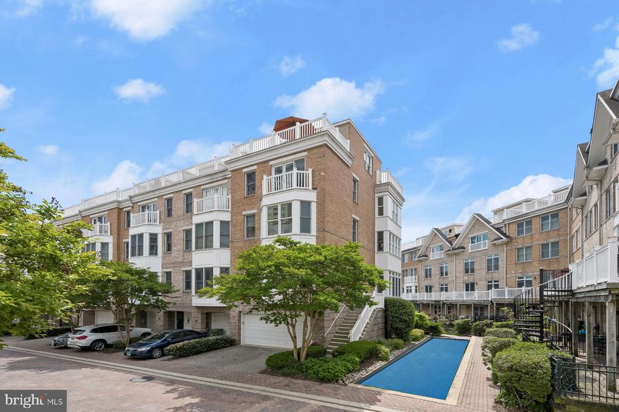 Rarely offered, this four bedroom corner residence with five level elevator is in pristine condition and features an impressive contemporary floor plan with over 3,300 square feet of luxury living spread out over five levels.  Envision your new lifestyle within the distinguished The Townes At Harborview Community.  

Accentuating this coveted “true” four bedroom home, exquisite finishes throughout are offered including a gourmet kitchen with breakfast bar, table space, sun room, stainless steel appliances, Viking gas range with overhead range hood, built-in microwave and dish washer, granite countertops, custom backsplash, touchless water faucet, crown molding and chair rail, hardwood flooring, level four wet bar and rooftop enclosure with ductless split climate control system and room for indoor dining.  The master bedroom and living room window treatments feature Hunter Douglas Duette motorized and programmable shades with blackout or filtered light settings and remote control.  

The ground level patio, kitchen balcony, and spacious rooftop terrace all offer ample space for outdoor entertaining and gardening.  Further showcasing this premium location are panoramic water and city skyline views from the rooftop terrace complemented with direct facing views of the community koi pond.

Parking for four vehicles is provided for within the attached two car garage and two car parking pad. 

Community amenities include 24/7 security & on-demand security escorts, a guest parking lot (paid daily or monthly parking options available), outdoor pool, private fitness center, monthly water bill, private trash & snow removal, marina, Mediterranean restaurant, Italian deli & market and beautifully landscaped grounds. A conveniently located water taxi can take you to explore any neighborhood in the city. 

RECENT UPDATES THROUGHOUT THE HOME INCLUDE: Renovation to all three exterior bump-out finishes, replacement of roof top terrace flooring and underlayment, rooftop siding and overhang, roof level sliding glass door and screen, replacement of both HVAC systems (2012 and 2019), hot water heater (2014), installation of rooftop ductless split climate control system (2015), new kitchen appliance suite including Viking range with range hood, built-in microwave, dishwasher and touchless water faucet, installation of insulated garage door with new garage door opener, replacement of washer and dryer with full sized LG units, addition of natural gas outlet for kitchen level outdoor grill, updated elevator controller and floor levelers (2021), and new carpeting throughout third level and upper level bedroom (2023).

With countless shopping, dining and entertaining options just minutes away from this centrally located Inner Harbor property you can enjoy a lifestyle offered nowhere else in Baltimore.   Offering a premium central location with privacy and exceptional waterfront views this home has it all. 

** Don't Miss The 3D Tour Link & Floor Plan To Get A True Sense Of All That This Home Offers**