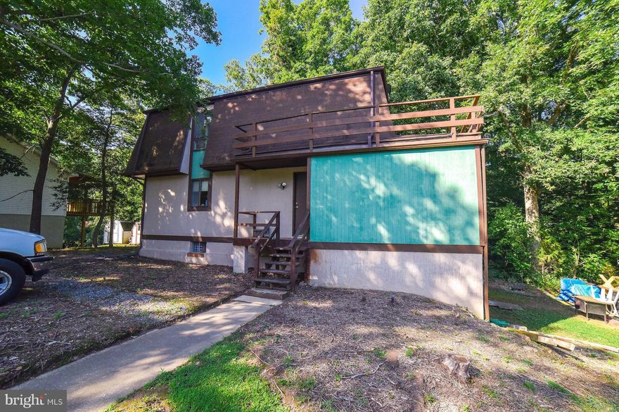 Great opportunity here.  Home needs some work, but what a great lot, with lots of potential.  3 bedrooms, 2 full baths. Main level bedroom, and open floorplan.  Full basement. large deck.