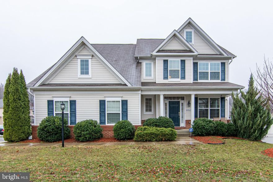 This gorgeous colonial in sought after Bryans Crossing has everything! The eat-in kitchen features granite countertops, island & stainless steel appliances. This opens up to a large family room with a gas fireplace.  A separate formal dining room, butlers pantry, living room, office and half bath complete the main level. The enormous master suite boasts vaulted ceilings, TWO walk-in closets and a large sitting area. The master bathroom includes a dual vanity and soaking tub. The walkout basement features an exercise room, rec room, full bath and theater room - perfect for entertaining! A new VINYL/composite deck, VINYL fenced in large backyard with shed, custom fitted faux wood blinds (valued at over 2k), custom shelving for additional storage space in the garage and utility/storage room, security cameras and motion detecting flood light over the garage complete this TOTAL package!