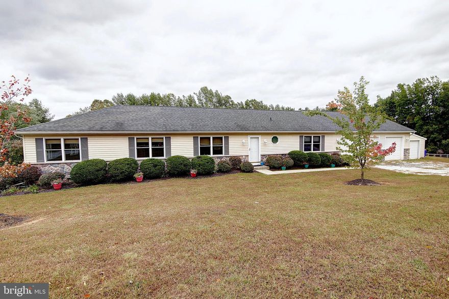 One of a kind Ranch home situated on 3 private acres! This home is a large family's dream with 6 bedrooms, 6 full bathrooms, and over 6,300 sq. ft.! It is fully equipped with solar panels and an all-electric. Two individual living spaces are adjoined with an oversized sunroom with ceramic tile floors. Each wing of this home contains a  gourmet kitchen with a combined dining area, hardwood floors, 9' + ft. ceilings, 3 bedrooms, 3 full bathrooms,  family room off the kitchen, and two separate laundry rooms. The kitchens are gorgeous with upgraded granite countertops, stainless steel appliances, beautiful cabinetry, and tiled floors. The main level contains 4 bedrooms (2 on each wing). The lower levels each have 1 additional bedroom with 1 additional full bath. Located in Howard County and close to I-70, it doesn't get much better than this!