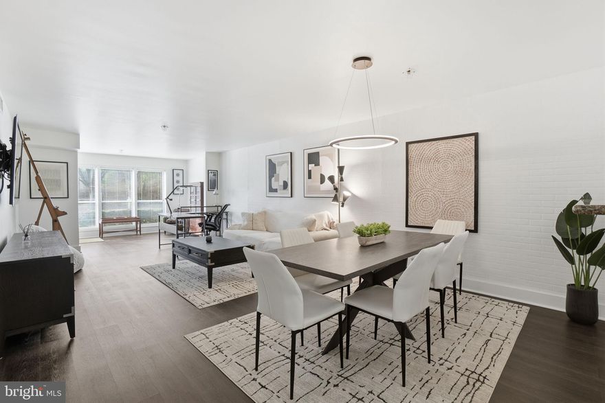 This larger 1-bedroom model in Four Winds offers a rare amount of space for the category, with approximately 1,100 square feet and a sunroom extension that adds meaningful flexibility to the layout.

The home has been well maintained and features stainless steel appliances, granite countertops, updated flooring, and a fully remodeled bathroom. The additional square footage is noticeable right away, making it a strong option for anyone looking for more than a typical 1-bedroom setup.

What really sets this unit apart is its ground-level location with a walkout to a large, open green space—something that’s hard to find. With entrances on both the front and rear of the unit, there’s also easy access and plenty of convenient parking.

From a location standpoint, it’s hard to beat—there’s a Metro bus stop directly outside, with quick access to I-66, Route 123, and I-495, along with nearby Metro stations. Community amenities include an outdoor pool and exercise room, making this a very practical, low-maintenance option in a highly convenient setting.