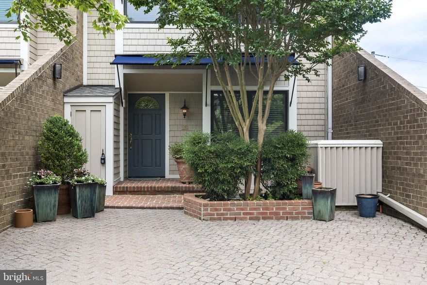 Stunning townhome updated and renovated to perfection. High end custom trims, plantation shutters, moldings and beautiful  builtins. Luxurious master bath.Private courtyard, multiple balconies. Community pool and patio area overlooking the Severn River, Naval Academy, and Historic Annapolis. The Best of Eastport living all within a Gated community.Super location