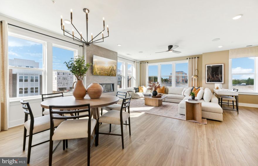 NEW CONSTRUCTION – July of 2025 projected delivery date! Exceptional Value $25,000 Flex Cash already applied to Sales Price. $25,000 in Closing Costs tied with the use of Pulte Mortgage Corporation.  This Upper 2-level Sydney condo offering the space of a single-family home where every space is thoughtfully considered. The home offers 3 Bedrooms, 2.5 Bathrooms, a Study, 1-Car Garage & 1 Car Driveway. The main level boasts an included covered terrace off the kitchen with an balcony extension. This home has an outdoor Gas Fireplace on the covered terrace and an electric fireplace with tile walls in the gathering room that is perfect for entertaining. The main level open floorplan with a private Study, and a huge walk-in Pantry. The Gourmet Kitchen is spacious and is complete with a large island with White Cabinets with Calacatta Laza Cascading Quartz. This home includes KitchenAid Stainless Steel Appliances with a 5-Burner Gas Cooktop, a Chimney Vented Hood and a Wall Oven/Microwave. The Owner's Suite has 2 large walk-in closets, a walk-in shower with seat with a frameless glass door, and a separate water closet and linen closet. The walk-in Laundry room has Whirlpool washer and dryer. This home has an EV rough-in plug and upgraded wiring package.  Oak stairs all the way up to the bedroom level and 9" wide LVP on the main level and the upstairs hallway.