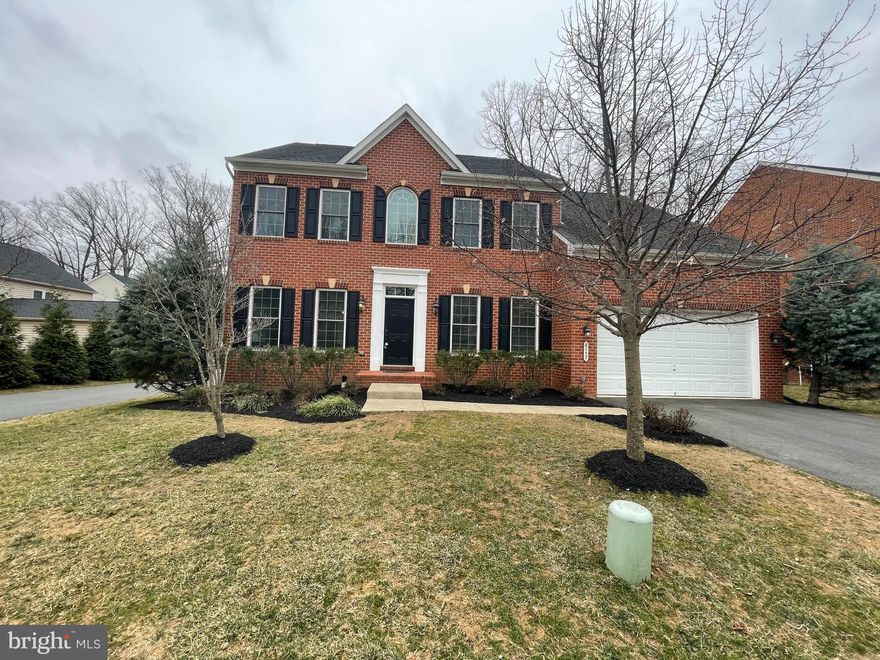 <b>Stately Colonial in the Heart of Vienna – Sought-After Amanda Place Community</b>
Welcome to this elegant and spacious Colonial-style home, ideally situated in the desirable Amanda Place neighborhood of Vienna. From the moment you step into the impressive two-story foyer with its sweeping staircase, you’ll feel the charm and sophistication that this home offers.

Just off the entry, French doors open into a private library or home office—perfect for remote work or quiet reading. The formal living room, framed by classic Roman columns, flows seamlessly into a banquet-sized dining room featuring a beautiful coffered ceiling, ideal for hosting memorable gatherings.

The heart of the home is the gourmet kitchen, outfitted with custom French-style cabinetry, granite countertops, stainless steel appliances, a wall oven and microwave, a 6-burner gas range, and a central island. The kitchen extends into a light-filled sunroom with soaring Palladian windows and a French door leading to an oversized deck—perfect for entertaining or relaxing outdoors.

Adjacent to the kitchen, the family room offers a warm, inviting space with hardwood floors and a striking floor-to-ceiling stone gas fireplace.

Upstairs, the luxurious primary suite is a true retreat, featuring a coffered ceiling, spacious sitting area, and a spa-like bath with jetted soaking tub, dual vanities, a step-in shower, private water closet, and a large walk-in closet. Three additional bedrooms and a convenient upper-level laundry center with utility sink complete this floor.

The finished lower level adds incredible versatility with two expansive recreation rooms, a fifth bedroom and full bath—plus a wet bar with granite counters and a dishwasher. There’s also rear access to the yard from this level, making it a great space for guests or extended living.

A front-load 2-car garage offers easy access straight into the kitchen, and the home features a dual-zoned HVAC system for year-round comfort.

<b>Location, Location, Location!</b>
Just minutes from downtown Vienna, Merrifield, the Mosaic District, and Tysons Corner, with easy access to major highways and the Orange Line Metro. You'll also love the proximity to top-rated schools, the Dunn Loring Community Swim Club, and a variety of shopping, dining, and entertainment options.

This exceptional home truly has it all—space, style, and a location that can’t be beat.