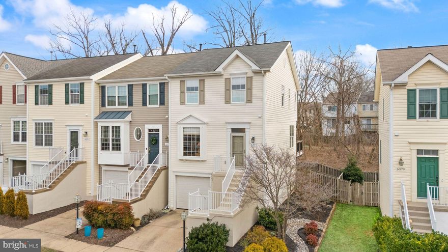 Beautifully upgraded 3BR/2.5BA end-unit townhome offering exceptional indoor-outdoor living. The main level features a cozy living room, dedicated dining area, and updated kitchen with quartz countertops, flowing into a sitting area with access to the composite deck with power retractable awning. The walk-out lower level includes a spacious rec room, utility room, interior garage access, and opens to a large, low-maintenance synthetic turf yard—rare for a townhome. Upstairs offers two hall bedrooms, a renovated hall bath, and a private primary suite with bump-out, renovated en-suite bath, and walk-in closet with custom built-ins.

Recent Improvements: 2024 composite decking, luxury vinyl plank flooring (main level), porcelain tile entry, garage door and opener, carpet on stairs and bedrooms two and three, 2023 quartz kitchen countertops, 2022 professional landscaping and half bath renovation, 2021 dishwasher, front door, storm door and shutters, 2020 synthetic lawn, stove, microwave and refrigerator, luxury vinyl plank flooring (lower level), upstairs hall bath renovation, 2019 power retractable awning and sliding glass doors, 2018 primary bath renovation and porcelain tile kitchen flooring, 2008 primary bedroom hardwood floors.

Major Systems: roof 2018, water heater 2016, furnace 2014, air conditioner 2007, windows 1997.