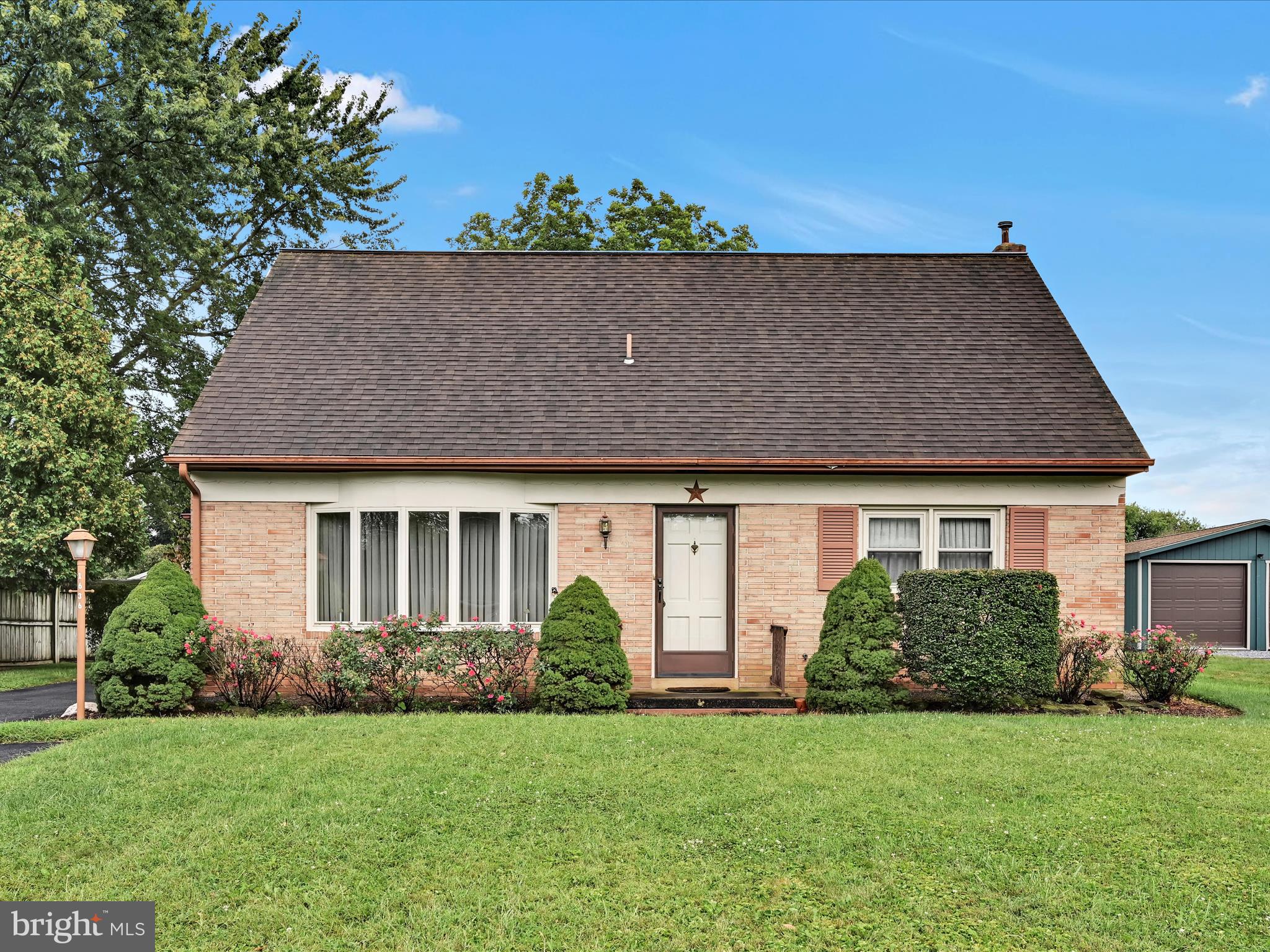 This charming Cape Cod home, originally built in 1963 (Sherman & Walton)and thoughtfully updated in 1995, offers a perfect blend of classic character and modern comfort. Nestled on a generous 0.22-acre lot, the property features a beautifully landscaped yard that invites outdoor enjoyment and relaxation. The level terrain provides ample space for gardening, play, or simply unwinding in the fresh air. The exterior showcases durable brick and masonry construction, ensuring lasting appeal and low maintenance. A secure storage shed adds convenience for your outdoor equipment or seasonal items. The inviting patio, complete with a roof, is ideal for entertaining or enjoying quiet evenings under the stars. Inside, the home boasts over 1380 sq. ft. of well-designed living space, featuring a mix of solid hardwood, vinyl, and carpet flooring that enhances warmth and comfort. With two bedrooms on the main level, and 2 large bedrooms upstairs, there’s plenty of room for guests or a home office. The main floor laundry hookup adds practicality to your daily routine. The finished rec room offers more family gathering space and includes a gas-fired stove for added warmth and atmosphere and a bar for entertaining! The other side of the basement offers plenty of storage and a laundry hook-up (chest freezer included). With an asphalt driveway accommodating three+ vehicles, parking is a breeze. This property is not just a house; it’s a place to create lasting memories. Experience the charm and comfort of this delightful home, where every detail has been considered for your enjoyment. Schedule your tour today for 8/22-24 and make your dream come true!