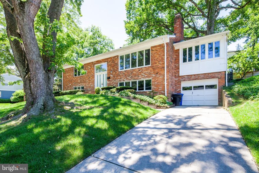 NORTH ARLINGTON *  WONDERFUL LIVING SPACES *TOP SCHOOL DISTRICT *  This beautifully designed two-story home offers many expansive and versatile living spaces, perfect for entertaining and everyday comfort. 

The heart of the home is the generously sized, well-equipped kitchen - fully open to the stunning enclosed patio, bathed in natural light from windows on three sides and featuring a vaulted ceiling and sliding glass doors that open to the backyard. Whether used as a family room, breakfast nook, playroom, library, or entertainment space, this room invites creativity and flexible living.

The spacious dining room opens to an expansive living room, complete with a cozy wood-burning fireplace and a wall of windows that flood the space with natural light. Adjacent to these is a versatile bonus room ideal for use as a home office, playroom, library, or media room.  The private wing of the home, also situated on the main level, offers a serene primary suite with an ensuite bathroom and walk-in closet, along with two additional bedrooms down the hall.

Lower level features an oversized bedroom suite with a fully renovated bathroom and an extraordinary mirrored dressing room, offering plenty of closet space. Also on this level is a large family room with a second wood-burning fireplace, plus a laundry area, workshop, utility room, and walk-out access to the side and backyard. A one-car garage provides additional storage or workspace and opens directly into the lower-level family room for added convenience.

Nestled on a lovely corner lot in a serene and private neighborhood, just minutes from Washington DC. Small pets considered on a case-by-case basis. Available November 1st!