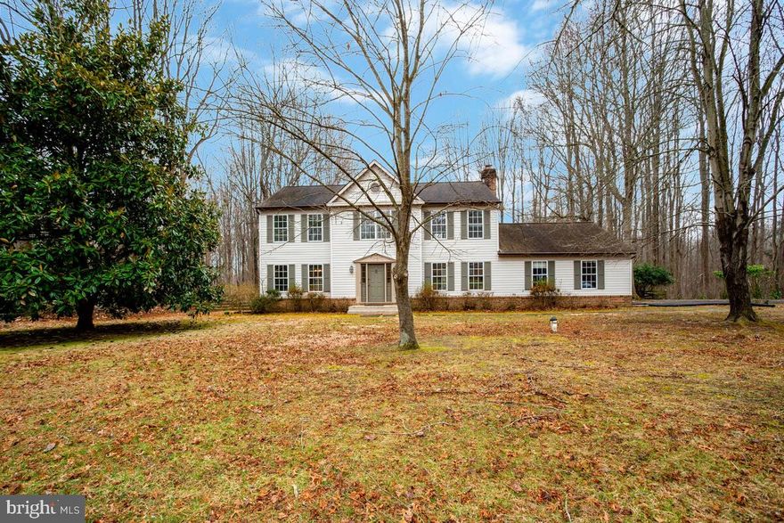 Nestled on a picturesque 2-acre lot, this spacious home offers the perfect blend of open and wooded space—one acre is fenced and cleared, while the other provides a natural, wooded retreat. Inside, the inviting family room features a cozy fireplace, perfect for gathering. The spacious kitchen boasts a pantry and flows effortlessly into the separate dining and living rooms, ideal for entertaining. A charming, light-filled breezeway connects the kitchen and the laundry/mudroom, making a perfect sunlit spot for plants. The mudroom also offers a brand-new utility sink and direct access to the side-load 2-car garage.
Upstairs, the expansive primary suite includes a sitting area, a generous walk-in closet, and an en-suite bath with a double vanity. Freshly painted throughout with brand-new carpet, this home is truly move-in ready! The huge unfinished basement provides endless potential, with a bathroom rough-in and an exterior exit, making it easy to customize for additional living space. Great location - country feel yet super convenient to shopping and parks.  Floor plan and location survey are included in the documents. Don’t miss this incredible opportunity!