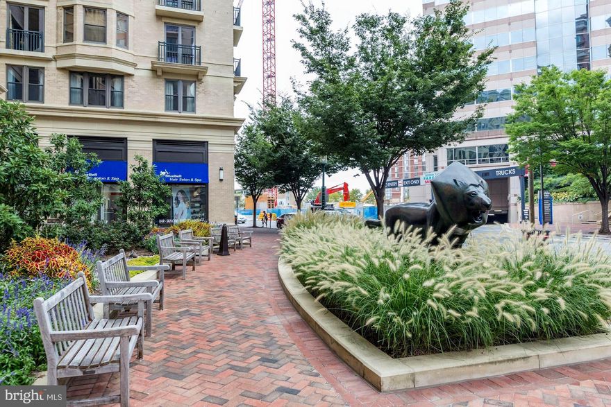 Elegant and sophisticated living in a full service building. Uniformed doorman, 24/7 Concierge and valet parking for you and your guests. Enter this 2BR/2FB + den condo and you will be delighted with the natural light from the many windows and the view overlooking the trees of Edgemoor. Viking appliances, hardwood floors, granite counters and luxury baths are but some of the many features. The MBR is spacious with two walk-in closets and a balcony which faces west for sunset views. The MBA has double sinks, large shower and separate tub for relaxing. There is also a stacked washer /dryer with an extra built-in closet for cleaning supplies etc. This condo also has 2 parking spaces and a storage unit all with close proximity to the elevators. Before construction the owner customized the floor plan by eliminating a wall in the bedroom affording a seamless family room off the main living area. The den with double door entry is currently being used as a guest BR. Should the new owner desire the wall and door for the 2nd BR will be installed at sellers expense. Pets allowed with size restrictions. The location of Lionsgate cannot be beat. Walk to metro, grocery stores, restaurants and all the shopping, movies of downtown Bethesda. Or hop on the free Circulator Bus in inclement weather.