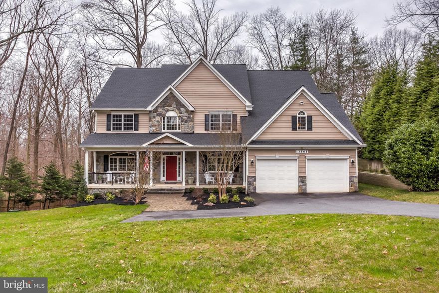 Enjoy three levels of luxurious living in this custom-built colonial. From the covered front porch, step into a spacious two-story foyer with a gracefully curved front staircase and oak hardwood floors. On the main level find a formal living room and a dining room with butler s pantry that opens into a stunning gourmet kitchen with an oversized island and a wide window seat. Delightful details continue in the large sunken family room with stone-fronted fireplace and coffered ceilings, and home office offering a wall of built-in shelves. Two main level powder rooms provide extra comfort for guests. Upstairs, the master suite boasts a grand master bathroom with jacuzzi tub and walk-in shower, separate walk-in closets and a tucked away den/nursery. Two more generously sized bedrooms share a large bathroom, a fourth bedroom with its own en-suite and spacious laundry room complete the upper level. The finished lower level provides loads of additional space for living and recreation, including a fabulous in-home theater and a private guest room with its own full bath. The lower level steps out to a back patio surrounded by premium landscaping. A recently replaced roof and hot water heater provide even more value to this impeccably maintained family home.