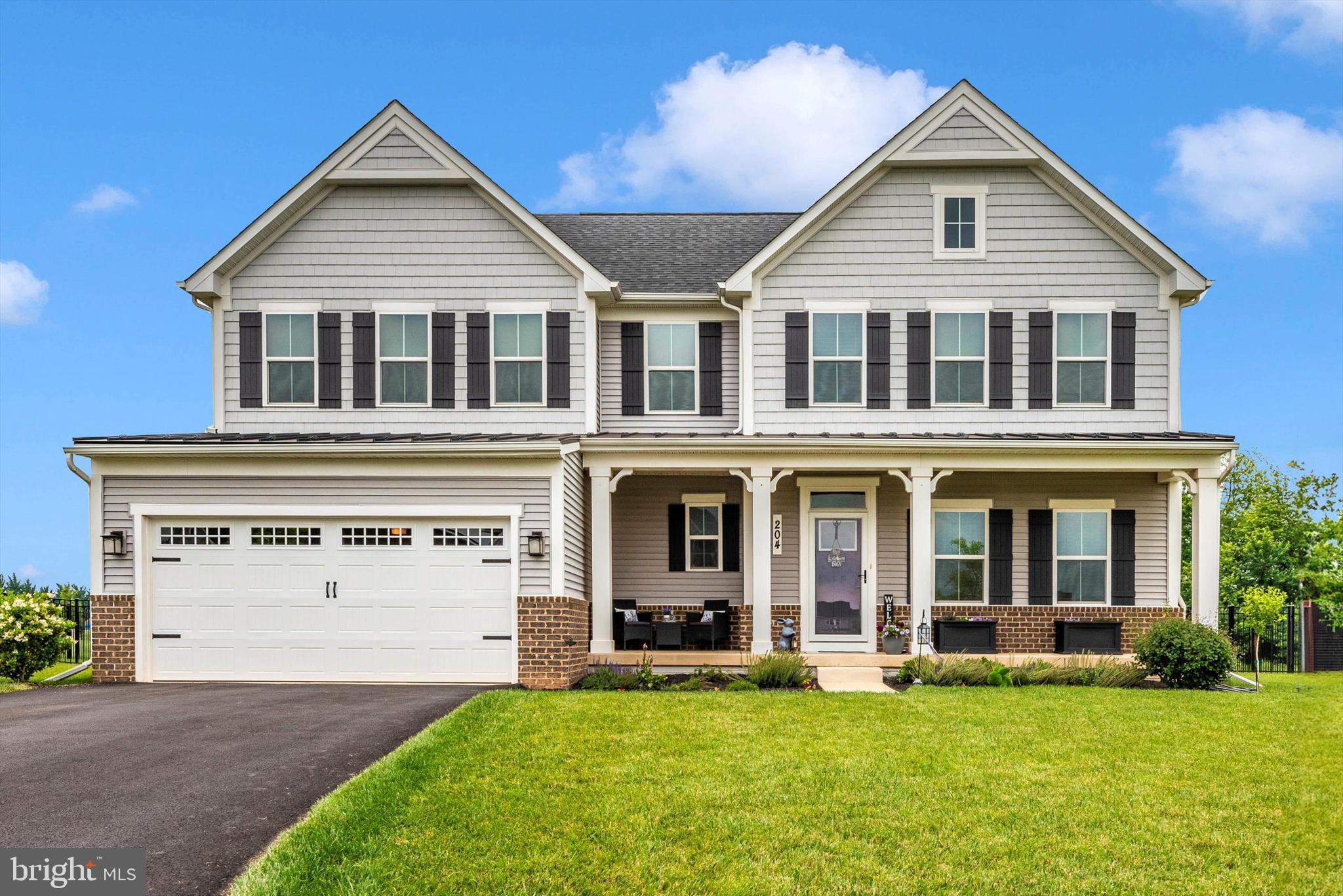 Loaded with upgrades and beautifully maintained! Gorgeous Ryan Roanoke floor plan in the Spring View Estates community now available! Located within walking distance to Walkersville Schools, this home is one of the largest models available within the community and is situated on a 1/2 acre lot backing to trees and open space. At the center of the home is a gourmet kitchen with stainless steel appliances, two ovens, 5/6 burner gas cooktop with griddle, built in microwave, Quartz countertops, center island, Italian marble backsplash and upgraded dove tail construction cabinets with soft close feature. Gas fireplace, craftsman trim and door package, recessed lighting and window blinds accent the space. Hardwood flooring covers the entire first floor with new carpet on the stairs, upstairs hall, owner’s bedroom and bedroom 2. Luxurious owners retreat features a tray ceiling, his and her walk in closets, and spa like private bath. All full bathrooms’ in the home feature upgrade cabinets, tile and upgraded Quartz countertops. Entertainers dream with the oversized lower level recreation space which includes a wet bar with a wine refrigerator, wine/glasses rack, and granite countertops. Full Bath and egress window complete the space. The rear yard features a large covered patio, trek decking, powdered coated black aluminum fencing, and a storage shed. Schedule your private tour today, this home is a must see!