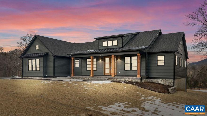 Beautiful Custom Home on two private acres with mountain views in desirable northern Albemarle County, only 10 minutes from downtown Charlottesville. This home has 4450 finished square feet offering 5 bedrooms and 4.5 bathrooms. Upgrades galore with designer cabinetry, a butler's pantry, linear gas fireplace, wet bar with cabinetry in the basement, and a large covered screened porch to capture views. This maintenance free home is 100% complete and move-in ready!  Schedule a tour today!,Painted Cabinets,Quartz Counter,Fireplace in Living Room