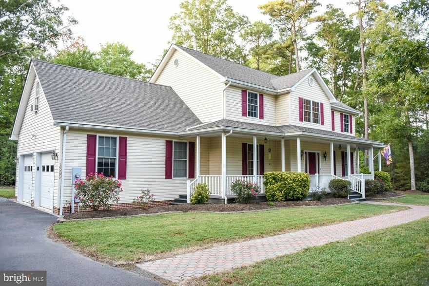 Beautiful spacious home in established subdivision on over 3 peaceful areas.You'll love the full country porch & enjoy this open floor plan w/ Hickory  hardwood floors through main level.Freshly painted w/ new carpeting in upper level. MBR walk-in closet & deluxe bath.For you hobbyist, car lovers, mechanics- checkout this detached oversized 2 car garage complete w/bonus area above! Community pool