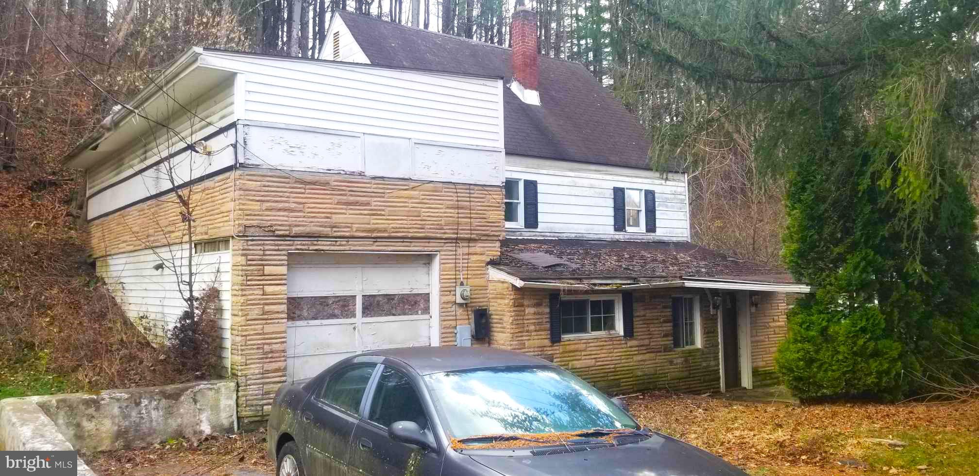 HANDYMAN SPECIAL - THIS HOME SITS ON JUST OVER 1/2 ACRE - HAS GREAT POTENTIAL BUT NEEDS WORK - CLOSE TO ROCKY GAP CASINO - I-68 EAST AND WEST - ONLY A FEW MINUTES BACK TO TOWN - BRING YOUR HAMMER AND A GOOD IMAGINATION - SOLD STRICTLY "AS-IS"