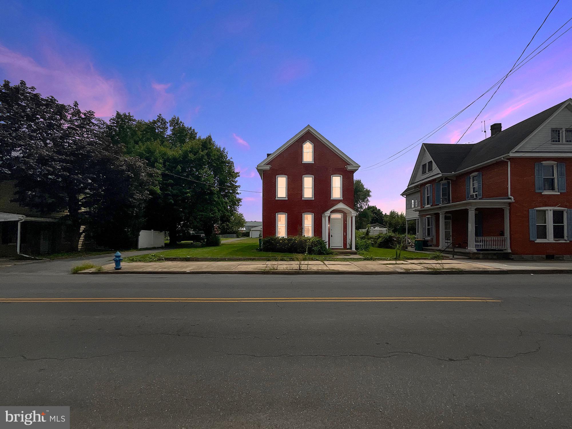 Welcome to 540 Broad Street in charming Chambersburg, PA—an inviting 3-bedroom, 1.5-bath home offering an abundance of space both inside and out. This thoughtfully designed property features a spacious layout with two staircases leading to the upper level, providing added convenience and character. The open kitchen flows seamlessly into the living areas, perfect for entertaining or everyday living. One of the upstairs bedrooms offers access to a second story deck, creating a peaceful retreat for morning coffee or evening relaxation.
Outside, you'll find one of the largest yards in the neighborhood—ideal for gardening, pets, or gatherings—with two versatile outbuildings, including one that could be used as a garage or workshop. Located just minutes from downtown Chambersburg, this home is perfectly positioned for enjoying the area’s many family-friendly attractions. Spend the day at Cluggy’s Amusement Center, cool off at the Chambersburg Aquatic Center, or explore nearby Michaux State Forest and Caledonia State Park. With easy access to parks, shops, dining, and top-rated local schools, 540 Broad Street offers a rare blend of space, functionality, and community charm in the heart of Franklin County.