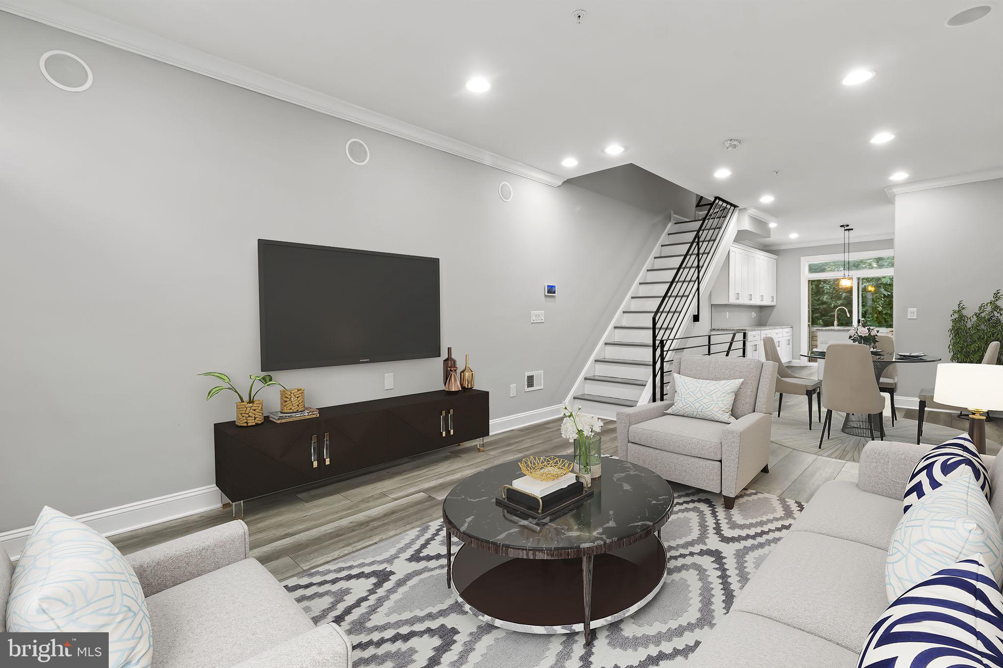 AVAILABLE FOR IMMEDIATE MOVE-IN: Welcome to 1710 N Lambert St in Brewerytown and only 8 minutes walk to Temple University! New Construction! Stunning, recently built row home with 4 bedrooms and 3 bathrooms, located in the heart of Philadelphia with over 6 years remaining on the tax abatement. Sprawling over 2,300 sqft, this 4 bed, 3 bath luxurious home comes with a smart thermostat and alarm system, a private backyard, and a rooftop deck with a breathtaking view of the Center City skyline. Upon entering, hardwood floors and crown molding flow throughout the open first floor. Tall ceilings (9 feet!), oversized windows, and a glass slider maximize the natural sunlight pouring into the home. The kitchen is outfitted with granite counters, stainless steel appliances, under-cabinet lighting, and ample storage in your shaker-style cabinets. Two generous-sized bedrooms are found on the second floor, with a full hall bath, a linen closet, and a convenient laundry closet. The master suite spans the entire third floor providing the utmost privacy and a beautiful spa-like bathroom. Escape to your roof deck to soak up the city views and fresh air. A fourth bedroom and third full bath are found in your finished basement and plenty of extra storage finishes this home off. About The Neighborhood: Located in the Sharswood community of Brewerytown, minutes away from Rittenhouse Center City Philadelphia, Fairmount, and Art Museum area. Walkable to local favorites such YMCA, Grocery Outlet, Fresh Grocer, AMC theatre, gym, urgent care, and so much more. Minutes to public transportation: Septa bus routes, #3, #33, and #61 only one to two blocks away. Conveniently located just a 10-minute walk from the BSL NRG Station to Fern Rock TC at the Cecil B Moore Station, and an 8-minute walk to Temple University. The home offers modern amenities, energy-efficient systems, and smart home technology. Also qualifies for up to $17,000 in grants for down payment and closing costs. Don't miss out on this urban oasis—contact me for details!