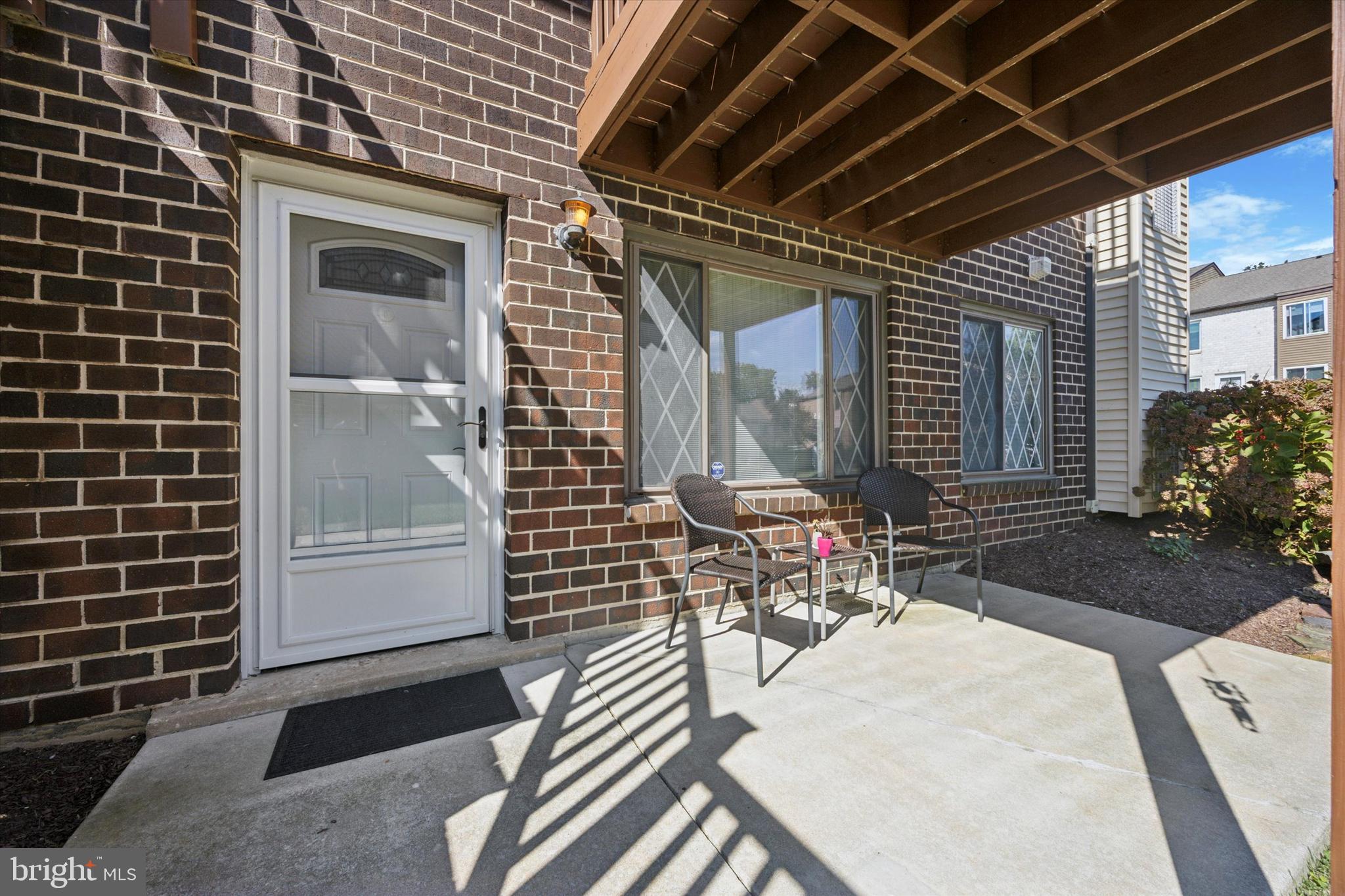 Wow!! This meticulously maintained 1st floor end/corner condo is being sold by the original owner! This is almost unheard of, and pride of ownership shines through the second you enter this home. A patio for outdoor relaxation welcomes you as you enter into the new front and storm doors. The large living room is wide open to the dining area and kitchen where the wall has been partially removed for a more open feeling. The kitchen also includes a dishwasher and a microwave, and even the refrigerator stays. There is a 2-year new heating and air conditioning system (2023), and it was also serviced in 2024. Thelovely full bath also has a beautiful newer (2023) walk-in shower with frosted glass doors and a transferable warranty. The washer and dryer are also included and are adjacent to the large bedroom and the bathroom. Condo fee includes water, sewer and trash as well as common ground, pool and a playground. This home has been so lovingly cared for. 1st floor end units rarely become available let alone one that has been lived in by the same owner for almost 47 years! Come see for yourself!