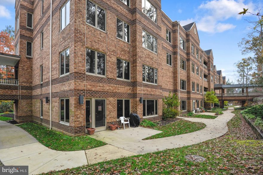 Lovely 1 Bedroom, 1 Full Bath Condo with Den in Villages of Wildewood 55+ Community.  Fabulous Light Filled End/Corner Unit with Gorgeous Wooded Views!  Very Spacious Home.  Kitchen has extra cabinets and Counters!  2018 Flooring and Newly Painted.   2018 HVAC.  Covered Walkway to the Clubhouse.  Social Activities, Card Games, Restaurant, Hair/Nail Salon, Bus Service, Exercise Room,  Sunday Brunch, Coffee and Tea on Weekdays.