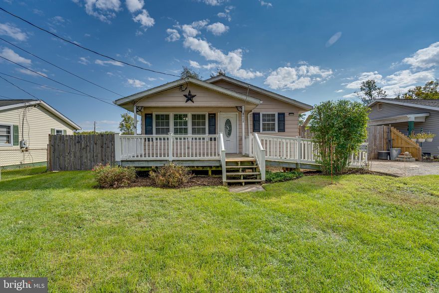 Nestled on a quiet, tree-lined street, this adorable one-level home is a charming haven with three bedrooms and one bath. Step inside, and you'll be greeted by the warmth of beautifully maintained wood floors . Natural light pours in through the windows, creating a cozy and inviting atmosphere. Efficient kitchen with appliances that convey with the property, including a washer and dryer. Outside, a 12x20(240sqft) shed/shop/outbuilding provides ample storage, while a privacy fence encloses the spacious backyard, perfect for family gatherings or gardening. A large front porch welcomes you to relax and soak in the tranquility of this lovely home.