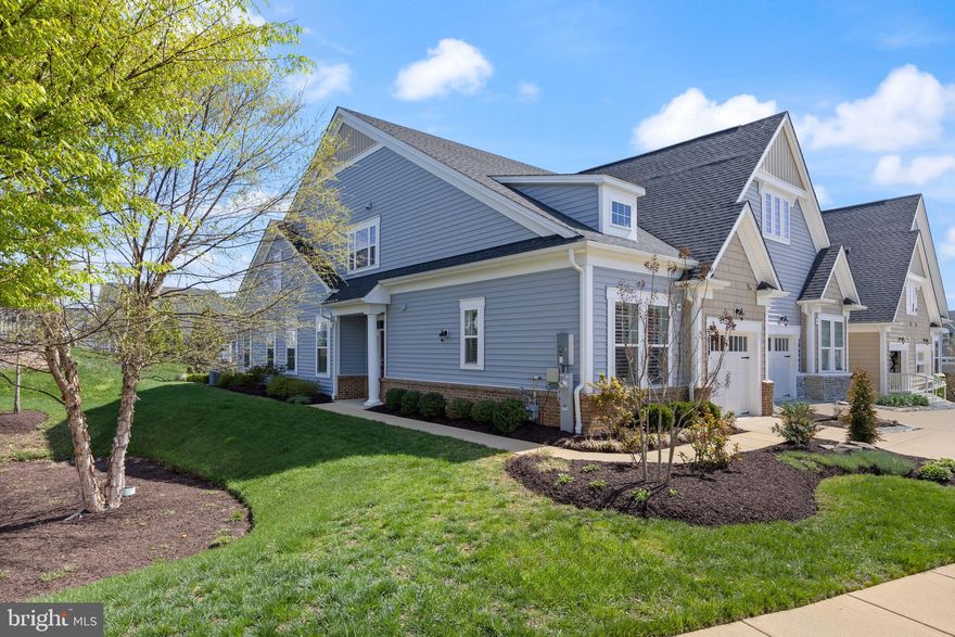 Welcome to this beautifully maintained villa-style home in the coveted 55+ community of Two Rivers. Immaculate and truly move-in ready, this home offers the perfect blend of comfort, style, and low-maintenance living. The main level features an open-concept layout with two spacious bedrooms and two full baths, including a serene primary suite with a walk-in closet and private bath. The gourmet kitchen is a showstopper, complete with quartz countertops, an island with breakfast bar seating, stainless steel appliances, and a ceramic farmhouse sink—perfect for both everyday living and entertaining. Upstairs, you’ll find a spacious den and a private home office or study, offering flexible space for your lifestyle needs. Step outside to a beautifully hardscaped paver patio that backs to a private common area, creating a peaceful outdoor retreat. Additional highlights include a one-car garage and a prime location with easy access to DC, Annapolis, Baltimore, Fort Meade, and NSA. As part of the vibrant Two Rivers community, you’ll enjoy a wealth of amenities including walking trails, indoor and outdoor pools, fitness center, tennis and pickleball courts, and a full calendar of social events. This is the lifestyle you’ve been waiting for—welcome home!