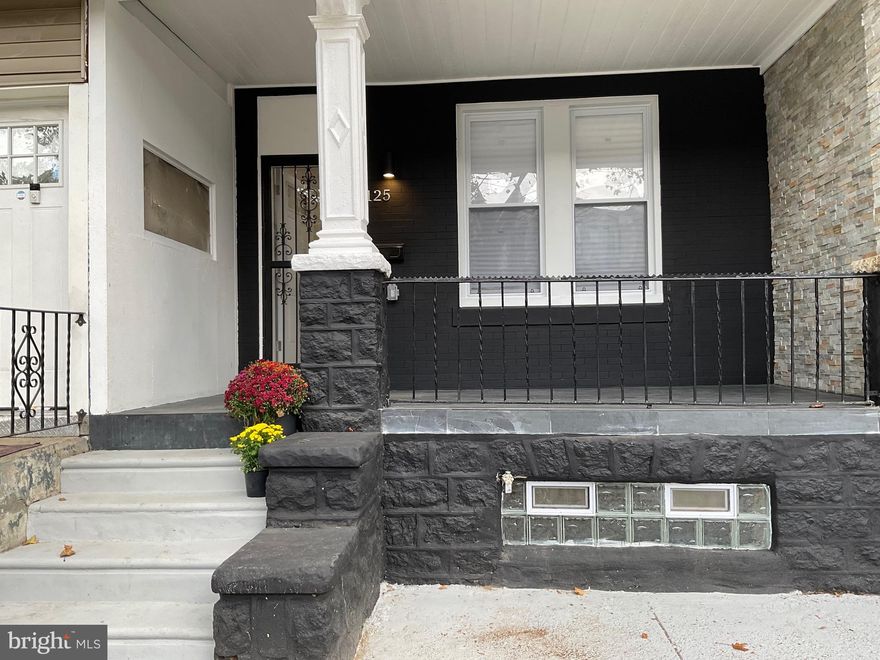 Price reduction !!Welcome to 125 N 60th St – a beautifully completely renovated, 4 bedrooms, 2 bath home, you are greeted by an inviting open front porch, a perfect spot to relax outdoor. Step inside and you'll immediately notice the abundance of natural light that floods the spacious open floor plan with added electric fireplace, leading to the beautiful eat-in kitchen that features raised white self-closing cabinets, subway-tiled backsplash, overhead custom built-in hood range, Quartz counter tops and a stainless-steel appliance package complete with a side-by-side refrigerator with front display, dishwasher and electric range stove. Convenience is key in this home, first-floor pantry for extra kitchen storage space, Outside, fenced-in backyard provides a private outdoor space, perfect for summertime grilling or simply enjoying the fresh air. Upstairs, you'll find four spacious (4) bedrooms, each offering ample closet space. The main hall bathroom has been tastefully updated and features a tiled shower-tub combo, tiled flooring and new vanity. Invite all of your friends and family over to enjoy the AC, Heated finished basement, wide staircase, where you'll discover a full bathroom that adds functionality and flexibility to storage space in the front portion of the basement. Whether you're looking to create a media room, home office, or a cozy guest suite, the possibilities are endless! 125 N 60th Street offers a prime location with easy access to transportation, schools, parks, shopping, and dining.  Virtual tour available .  Don't miss the opportunity to make this exceptional home your own! Schedule a showing today!