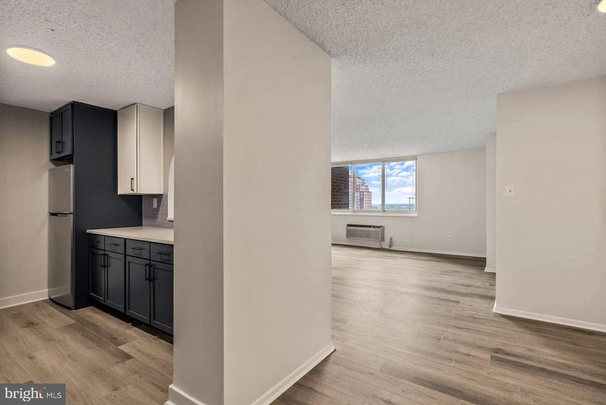 Welcome to 1500 Locust, a stunning apartment building located in the heart of Center City, Philadelphia. Situated just steps away from Rittenhouse Square and Walnut Street, this 45-story high-rise offers an unrivaled living experience with breathtaking views.

Our recently renovated residences feature modern finishes, spacious layouts, and an array of floor plans to suit your needs. As you step onto our rooftop pool and lounge, you'll be captivated by the sparkling city vistas that stretch before you. It's a setting that even William Penn himself couldn't have imagined.

Exceptional living awaits you at 1500 Locust, where we provide amenities that elevate your day-to-day life. Take a dip in our heated indoor pool, relax on the rooftop terrace, or stay in shape at our state-of-the-art fitness center. We offer a range of layouts, from studios to three-bedroom apartments, all equipped with washers and dryers for your convenience.

At 1500 Locust, we understand that your lifestyle needs vary. That's why we offer a seamless transition from an active to a relaxed atmosphere. Whether you seek a place to unwind, pamper yourself, or energize for the day ahead, our community has you covered.

Surrounded by a historic and vibrant neighborhood, you'll find a wealth of fine dining experiences and high-end shopping options just moments away. Rittenhouse Square, with its lush greenery and beautiful trees, serves as the centerpiece of this dynamic locale.

Our newly renovated Rittenhouse Square apartments blend modern minimalism with welcoming warmth. With light-filled spaces, open floor plans, and upscale finishes, you'll feel right at home. Features include designer-inspired kitchens, stainless steel appliances, private balconies overlooking Center City, and full-sized washers and dryers in every apartment.

We understand that pets are family too, which is why we welcome them at 1500 Locust. Soon, our rooftop park will offer an elevated experience for your furry companions as well.

When you call 1500 Locust "home," you're embracing an elevated lifestyle that maximizes your downtime. Unwind in your beautiful space, join a yoga class in our fitness center, or meet friends for dinner and drinks. For a truly panoramic and invigorating experience, head up to the rooftop and soak in the serene view. We offer a variety of amenities, including a rooftop terrace and clubroom, indoor rooftop pool and jacuzzi, outdoor sundeck with private cabanas and grilling areas, media room with theater, 24-hour fitness center, resident catering kitchen, 24-hour concierge, garage parking, guest suite availability, and a pet-friendly environment.

Life is truly good at 1500 Locust, where you can relax, recharge, and indulge in all that Rittenhouse Square and Center City have to offer. Don't wait any longer—contact us today to discover your next home at 1500 Locust.

** Photos are of model units ** Pricing and availability subject to change on daily basis ** Parking may be available for additional monthly fee **