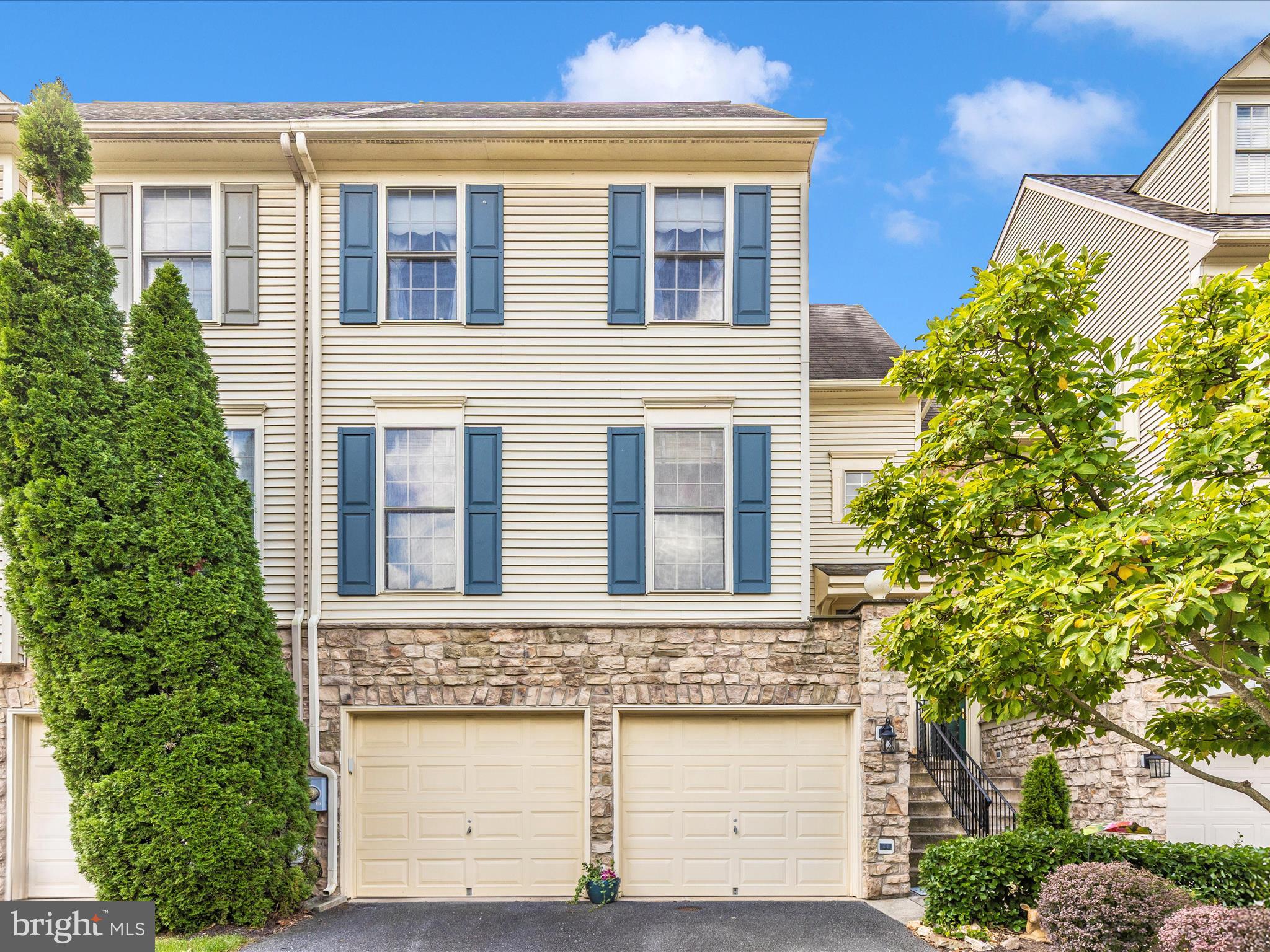 REDUCED!!! Welcome to this beautifully maintained townhouse in the highly sought-after Worman’s Mill community. Offering over 3,000 square feet of living space, this home features three fully above-ground levels—providing comfort and peace of mind without the concern of a basement. The entry level includes an oversized two-car garage, a spacious recreation room, utility room, and a large office that could easily be converted into an additional bedroom. There is also potential to add a full bathroom on this level. The main floor showcases a welcoming foyer leading to formal living and dining rooms, a well-appointed kitchen, and a comfortable family room with a gas fireplace. All the floors on the main level are beautiful hardwood.  A convenient half bath completes this level. Upstairs, the primary suite offers two closets and an ensuite bathroom with a dual-sink vanity, soaking tub, and separate shower. Additional bedrooms are filled with natural light, enhancing the home’s warm and inviting atmosphere. Recent updates include a new high efficiency gas HVAC system and a hot water heater installed just 2 ½ years ago. Outdoor living is made easy with two decks and a fenced backyard. This exceptional property combines thoughtful design, abundant natural light, and desirable updates in one of Frederick’s most coveted neighborhoods. Don't miss your chance to call this house your home!