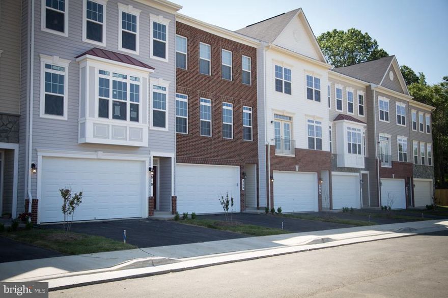 New Carlisle Ready Move In! 2 Car Garage! The Kitchen offers a Stainless Steel Appliance Package and has a Breakfast Nook. The Lower Level has been finished with a Rec Room and Powder Room. Community w/ Trail, Tot Lot and Basketball Court! Photos similar