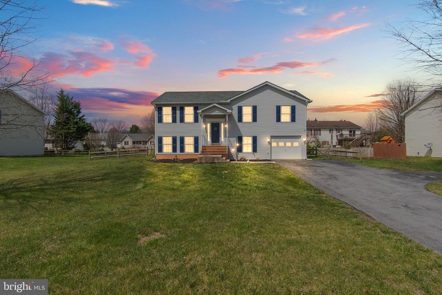 Charming 5 Bedroom, 3 Full bath, Split Foyer in desirable Spring Mills neighborhood.  Brand new Roof, Upgraded Kitchen with Granite Countertops and SS Appliances.  All of the Bedrooms have ceiling fans.  upgraded bathrooms, and upgraded thermostat.  Huge walk-in closet off the Primary Bedroom.  Wall to wall carpeting.  Fully fenced-in back yard, with Deck, big enough to place your Grill.  Only minutes from I-81 and I-70 in Maryland.  Great schools, and great commuter location.  HOA amenities include Community Pool, Tennis Courts, Walking Trails, Community Playground, and Snow Removal. Schedule your showing today!