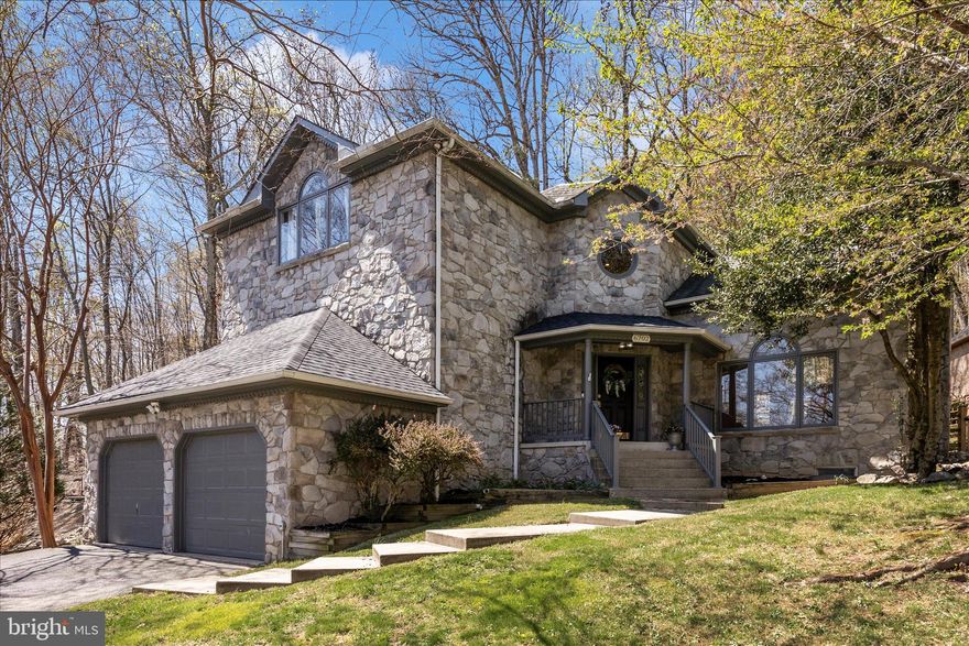 ***WELCOME TO THIS ABSOLUTELY STUNNING ALL STONE HOME IN THE SOUGHT-AFTER ASPEN VILLAGE OF LOVELY AMENITY RICH LAKE LINGANORE***WITH ALMOST 4000 SQUARE FEET ACROSS 3 FULLY FINISHED UPGRADED LEVELS, THIS AMAZING 4 BEDROOM & 4 BATH HOME SHOWCASES EXCEPTIONAL CRAFTMANSHIP WITH SOARING CEILINGS AT THE FOYER, TRAY CEILINGS, CUSTOM TRIMWORK THROUGH OUT, SHIP LAP,  PELLA CASEMENT WINDOWS,  RECESSED LIGHTING,  A LARGE MAIN LEVEL BEDROOM, A GREAT ROOM, SOLID WOOD FLOORING & STAIRCASE & SO MUCH MORE***THE GOURMET KITCHEN & FORMAL DINING ROOM CREATE THE PERFECT SETTING FOR ENTERTAINING WITH A LARGE CUSTOM ISLAND WITH SEATING, STAINLESS STEEL APPLIANCES, MAPLE CABINETRY & A GREAT AMOUNT OF LIGHTING ALONG WITH BOTH A STONE WOOD BURNING FIREPLACE & A SLEEK ELECTRIC FIREPLACE THAT ADD WARMTH & CHARACTER***THE OWNERS SUITE ENJOYS A TRAY CEILING, CUSTOM MOLDINGS & TRIM, SOLID WOOD FLOORING & A FULLY RENOVATED LUXURY BATH WITH A LARGE ENCLOSED SHOWER WITH TWO SHOWER HEADS INCLUDING A RAIN SHOWER HEAD, CUSTOM TILE, NEW FIXTURES & A MAKE UP VANITY***FULLY FINISHED BASEMENT WITH LVT STAIRS & FLOORING, AN EXERCISE ROOM WITH GYM FLOORING, REMODELED FULL BATH & LOTS OF RECESSED LIGHTING***THE PRIVATE YARD INCLUDES A DECK & BRICK PATIO, A HOT TUB &TRAILS TO THE LAKE AND DAM***BRAND NEW 16.6 SEER 5 TON HVAC SYSTEM***CINCH HOME WARRANTY***COME & ENJOY THE LAKE LIFESTYLE***LOVE WHERE YOU LIVE***