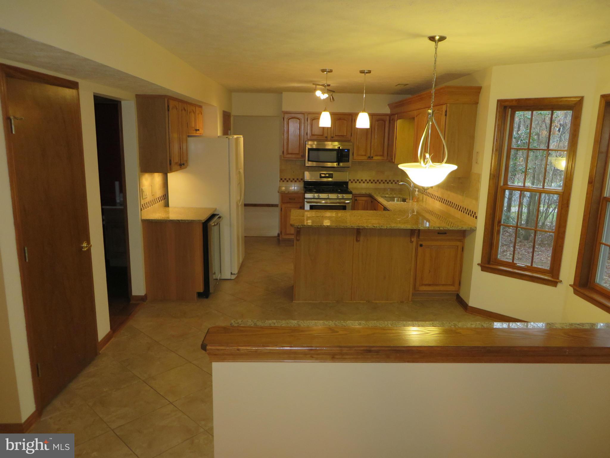 SYCAMORE HOLLOW OF WLDWD - Residential Lease