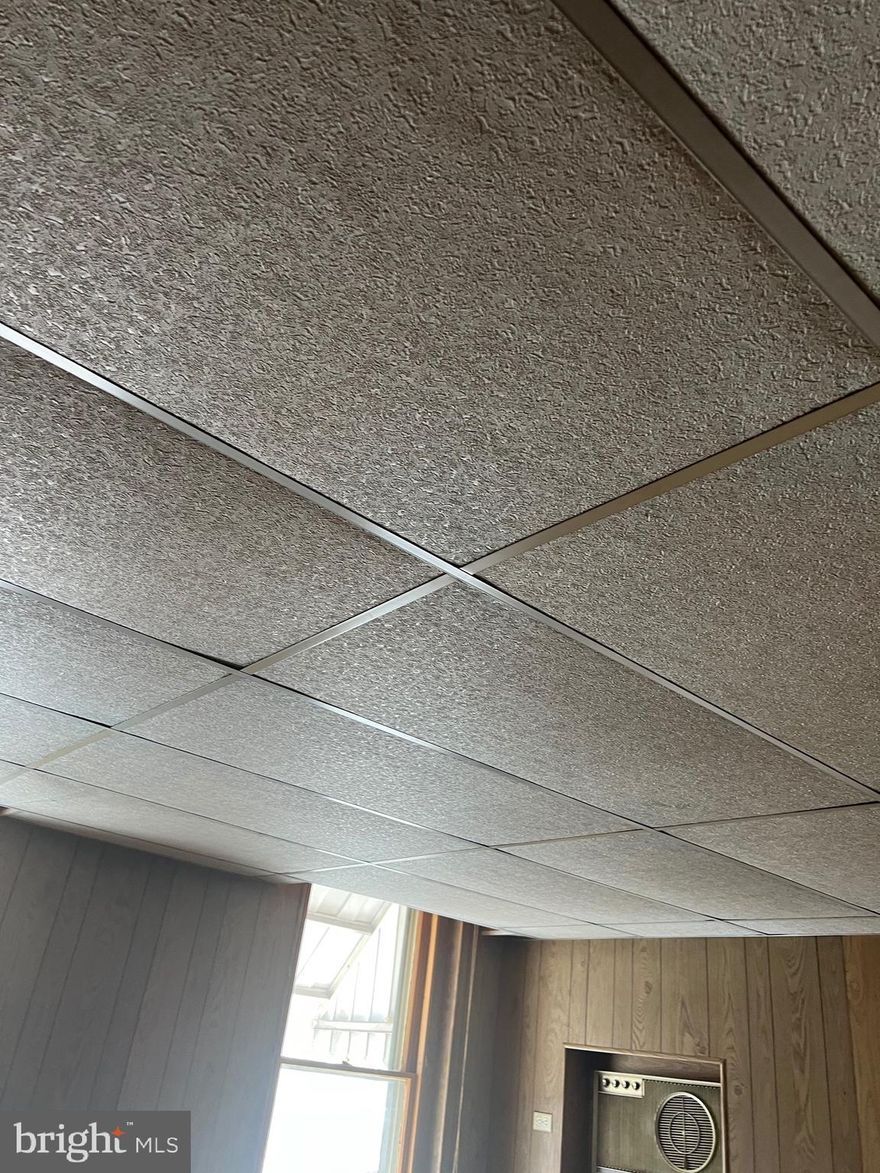 Calling all investors on this one. Property is in need of TLC. Call to show.