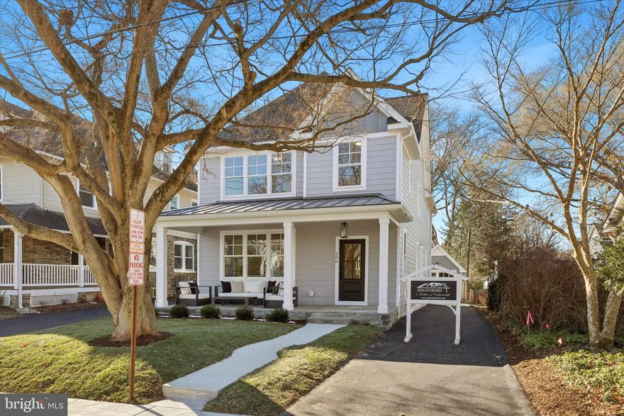 Rarely offered, ground-up new construction exquisitely crafted by Sposato Homes in sought-after Narberth Borough.  A generous stone front porch welcomes you to the home, and provides an outdoor living space that feels connected to the neighborhood. Inside, wood floors and tall ceilings run throughout the main living spaces. Oversized doorways lend an open feeling, joining the foyer, hallway, living and dining rooms, which are accented with stunning board and batten moldings and wainscoting. A gourmet kitchen opens to a great room with gorgeous coffered ceiling and cozy gas fireplace. The kitchen boasts custom cabinetry with crown molding, quartz countertops, a seven foot island, high end Thermador stainless steel appliances, including six burner gas range, and an eat-in breakfast area. A convenient mudroom area, pantry and powder room round out the first floor. Two doors lead to the back, outdoor living area, consisting of a sizable, low maintenance Timbertech deck, a level backyard, private driveway and entrance to the detached one car garage. Downstairs, the full basement with high ceiling provides plenty of additional space, a blank slate for possibilities like a home gym or an additional recreation area. Upstairs, wood floors continue into the light and luxurious primary suite, which has two fully fitted walk-in closets, as well as en suite bathroom with custom double vanity and large walk-in shower with glass door and built-in bench. Two additional bedrooms found on the second floor are carpeted and directly access a shared bathroom with tiled bathtub and shower, as well as a double vanity. A convenient separate laundry room with tiled floor, window, washer/dryer hook-up, cabinetry and utility sink completes the second level. On the third floor there are two more sizable, carpeted bedrooms, as well as a tiled hall bathroom with tub. Single family new construction homes of this quality and size are a rare find in the Lower Merion School District at this price point. Best of all, the location and walkability of this particular home is unparalleled, sitting on a friendly, sidewalk lined street only blocks away from Narberth Playground, library and ball fields in one direction, and all the downtown Narberth shops, restaurants, and train station in the other. The beautiful home embraces the conveniences and desires of modern living while providing wonderful opportunity to join the popular, vibrant Narberth community.