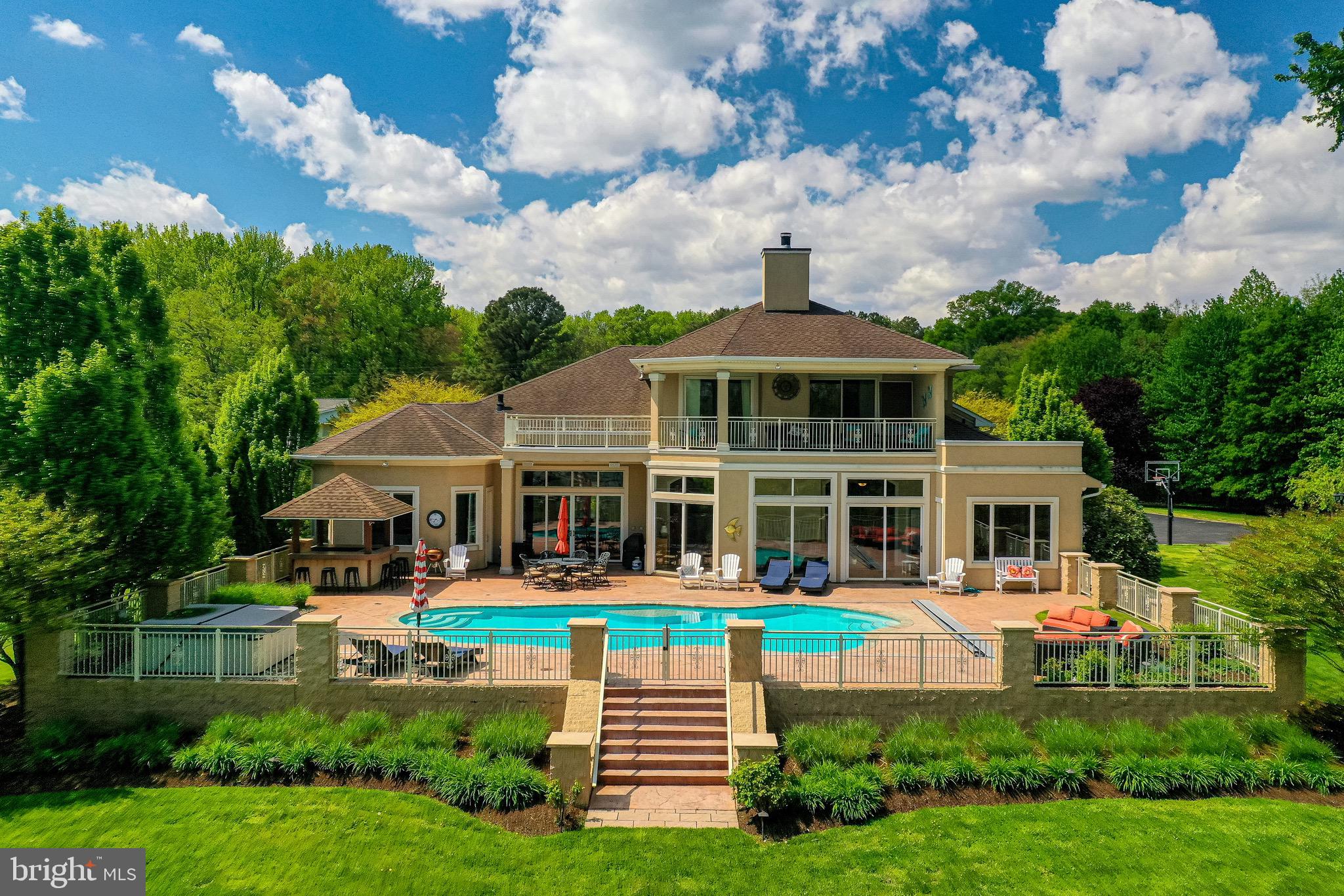 Spectacular, One Of A Kind Waterfront!
This Luxury Waterfront listing is truly a dream come true for anyone looking for the ultimate waterfront living experience. Sitting on a sprawling 3.5-acre lot, this property boasts a 3+ car attached garage and a 6+ car detached garage, providing ample space for all your vehicles and toys.
Inside, you'll find a spacious and beautifully appointed home with 4 bedrooms and 4 en suite bathrooms, perfect for hosting family and friends. The 12' ceilings give a sense of grandeur and spaciousness while the huge patio offers stunning water views.
Outside, the built-in pool with hot tub and tiki bar offers the perfect spot to relax and unwind while taking in the stunning views. The pier with 2 boat lifts and a jet ski lift offers endless opportunities for water sports and exploration.
Overall, this Luxury Waterfront listing offers the perfect combination of luxury, comfort, and convenience, making it an unparalleled opportunity for waterfront living.