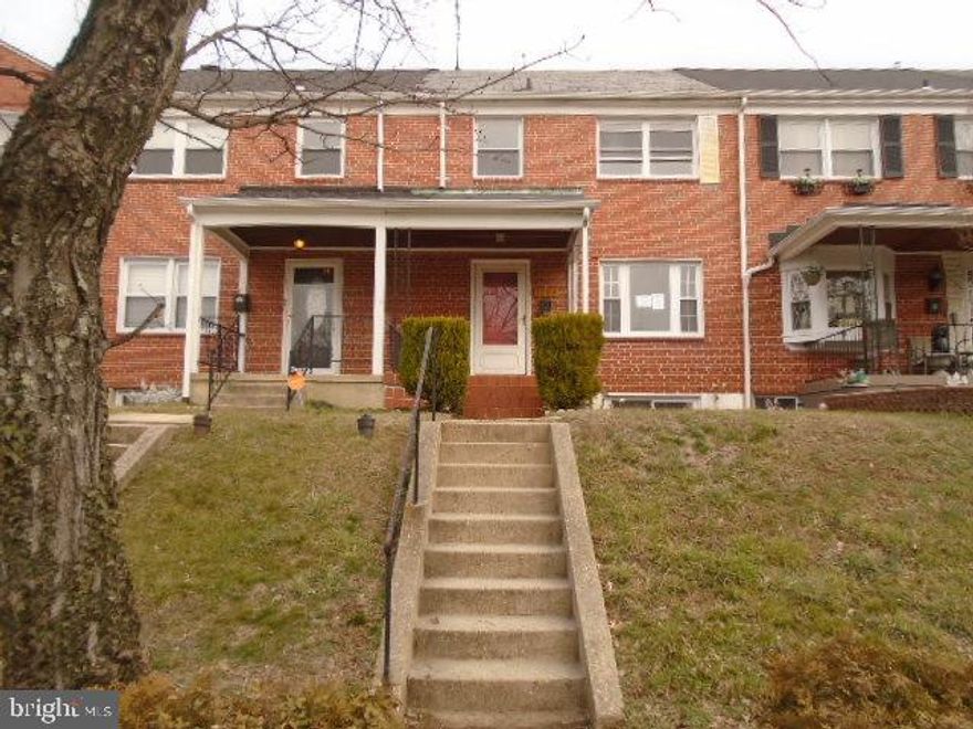 All Brick Home offers 3 levels of living space and parking pad in rear. Open floor plan on main level. Updates in the past to include windows, kitchen , baths & more ! Kitchen has lots of cabinet space and leads to rear yard. Upper level has 3 bedrooms and full bath. Walk up stairs to attic that is floored and lots of storage space. Lower is finished with family room and powder room. Utility area and storage. Covered front porch and rear porch . Close to schools, shopping and College's. Easy access to down town and 695. Agents please read agent remarks and documents on this listing for contract details. OPENS TO INVESTORS 3.24