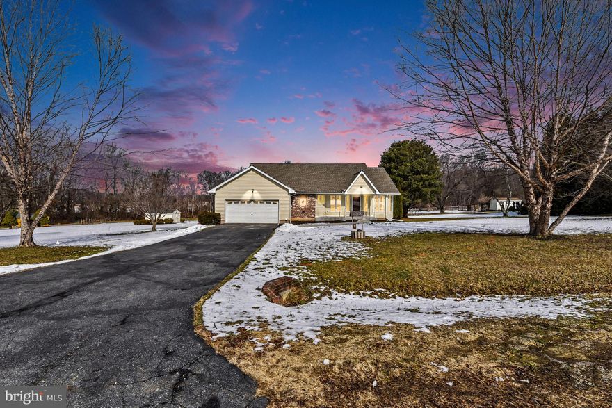 🌾 Nearly 3 Acres. Open Sky. Ready for Horses.
There is a certain stillness here that you feel the moment you arrive.
Nearly three acres unfold around this 4-bedroom, 3-bath ranch in Port Deposit — open pasture, wooded backdrop, and wide sky overhead. The land is usable and thoughtfully set up, making it especially well suited for horses, with run-in sheds and fenced areas already in place. Whether you ride daily or simply want room for animals and open space, the groundwork has been done.
Inside, hardwood floors carry through the main living areas, and a fireplace anchors the living room with warmth and character. The kitchen offers stainless steel appliances, generous cabinetry, and a bright eat-in space. 
The primary suite provides a quiet retreat, complete with a private bath featuring a soaking tub and separate shower — a comfortable place to unwind after time outdoors.
The finished lower level expands the living space with a fourth bedroom, full bath, recreation room with fireplace, and walk-out access to the backyard. It offers flexibility for guests, extended stays, hobbies, and additional workspace.
Recent improvements include a roof approximately three years old, HVAC approximately four years old and two hot water heaters.  
Set in a peaceful rural location yet within convenient reach of major routes, this property offers something increasingly difficult to find — land that feels intentional, livable, and ready for what comes next.
If privacy and open space have been on your list, this is worth experiencing in person.