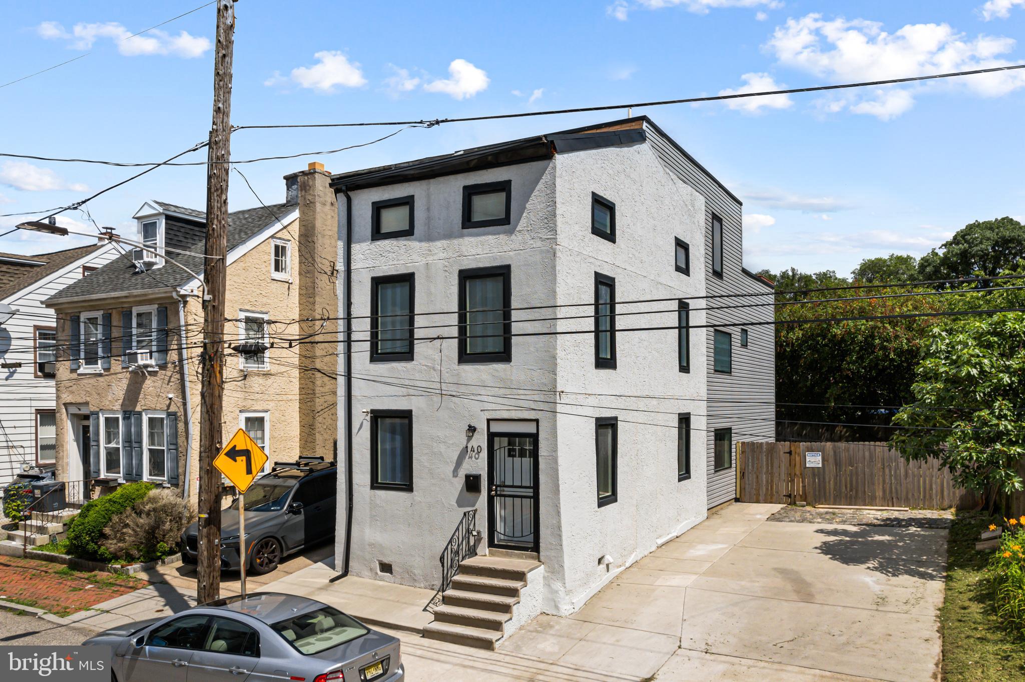 Fully Renovated 4-Bedroom Detached Home with Yard, Roof Deck & 4-Car Parking in West Germantown!
Discover a rare opportunity to own a fully updated detached home offering 4 bedrooms, 3 full bathrooms, 4-car parking, a large fenced yard, and a rooftop deck—features hard to find in the city! This home has been completely redone from top to bottom, with all major systems updated, including a brand-new roof, new windows, new HVAC, updated electric, new plumbing, and recessed lighting throughout—giving you true peace of mind.
The bright and open main floor offers a seamless flow from the living area to a spacious dining room and a stylish new kitchen, complete with a large center island, stainless steel appliances, and direct access to your own backyard oasis. The large fenced yard is ideal for outdoor entertaining, relaxing by the koi pond, and perfect for pets and children—plenty of space for to run and play.
Downstairs, the clean unfinished basement provides laundry facilities and ample storage. Upstairs on the second floor, you’ll find three generously sized bedrooms and two full bathrooms—two of which are en-suite (with a Jack-and-Jill configuration for flexibility). The private third-floor primary suite features a spa-like en-suite bath with a jacuzzi tub and direct access to a rooftop deck with expansion potential.
Conveniently located near the Chestnut Hill West SEPTA Regional Rail line and multiple bus routes (71, 81, 26, 41, 65, 53, 23), you’ll enjoy quick access to Center City, East Falls, Manayunk, Mt. Airy, Chestnut Hill, and the scenic Wissahickon trails. Nearby schools include Penn Charter, Pennsylvania School for the Deaf, Germantown Friends, The Waldorf School, Greene Street Friends, Anthony Wayne Academy, and Mastery Charter School. Walk to neighborhood favorites like Ultimo Coffee, Planet Fitness, and local businesses, or take a short drive to the shops and restaurants of Mt. Airy and Chestnut Hill. If you’re looking for a move-in-ready, modern home with generous space, outdoor living, and rare off-street parking—this is it! Please ask about buying with 144 W. Price (vacant lot).