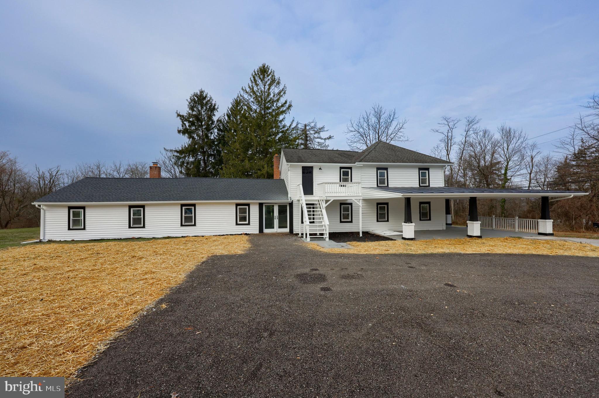 An incredible opportunity to own this nearly 3,000 sq. ft. home, set on 3.5 acres of private land. This beautifully remodeled farmhouse boasts a spacious layout, featuring a new roof, new fixtures, new flooring throughout, and a freshly painted interior. The main level offers a variety of living spaces, including a den, living room, family room, and a private office that could easily serve as a fourth bedroom. The kitchen is equipped with soft-close cabinetry, granite countertops, and seamlessly opens to the dining area, perfect for entertaining. For added convenience, a full bath and laundry room are also located on the main level. Upstairs, you’ll find a generous primary suite with a walk-in closet, en-suite bathroom, sitting area, and a private balcony. Two additional bedrooms and a guest bath complete the upper level. The wraparound front porch is the ideal spot to relax and take in the tranquil surroundings, with views of nature and wildlife.