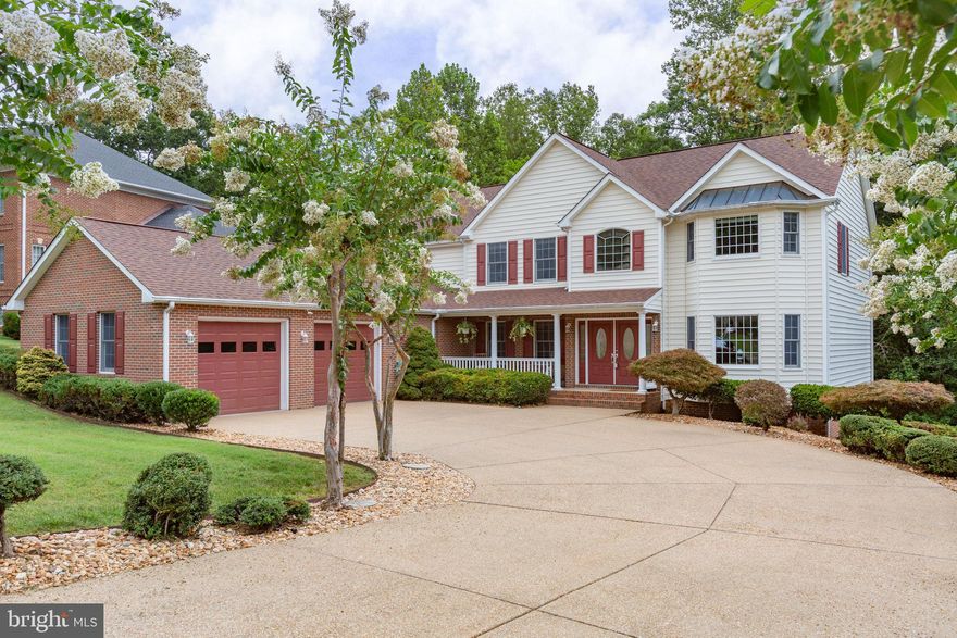 Discover the perfect blend of comfort and elegance in this stunning Colonial-style home nestled in the desirable Hills at Snowden community. Set on a generous 1.41-acre lot that backs to serene trees and woods, this property offers a tranquil retreat from the hustle and bustle of everyday life. Imagine sipping your morning coffee on the expansive deck, surrounded by nature's beauty, or hosting gatherings in the expansive open concept main level that invites endless possibilities. With 5 bedrooms and 4.5 bathrooms, this home is designed for both relaxation and entertainment. The heart of the home features a double-sided gas fireplace, creating a warm ambiance in both the family room and rec room.  It opens to the beautifully renovated kitchen with quartz counter tops, back splash and tons of cabinet space. The hardwood and ceramic tile flooring throughout adds a touch of sophistication, while the upper-floor laundry ensures convenience for busy lifestyles. The oversized side-entry garage provides ample space for vehicles and additional storage, making organization a breeze. The property reflects pride of ownership and attention to detail around every corner. Whether you seek a peaceful sanctuary or a vibrant space for entertaining, this home meets all your needs. Embrace the lifestyle you’ve always dreamed of in a setting that feels like a private oasis, yet is just moments away from local amenities, Hospitals, downtown Fredericksburg, Schools, shopping and more. Don’t miss the opportunity to make this exceptional property your own!