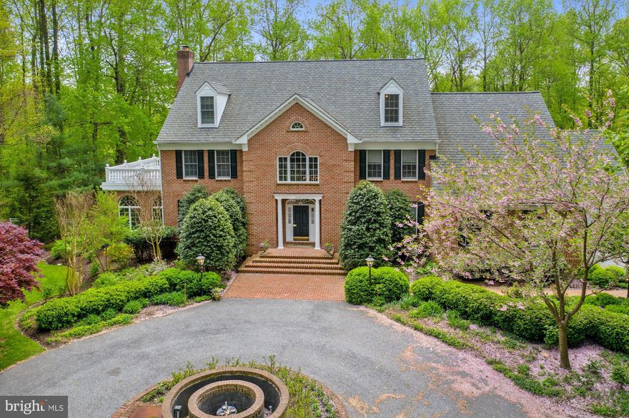 This all-brick manse located in the Huntington neighborhood sits majestically at the end of a meandering drive and opens out to lushly groomed, private grounds and expertly constructed outdoor entertaining areas.  A marble Grand Foyer w/ dramatic sweeping staircase welcomes guests and high ceilings, impressive millwork and gracious proportions continue throughout this spectacular home. 3 fireplaces, Main Level Study, Primary Suite w/ marble MBath, Sitting Room & 2 walk-ins plus a Lower Level boasting Theater, Exercise & Gaming Rooms as well as In-Law/Guest Suite quarters. Make this gorgeous property your "Caves Valley Resort"!