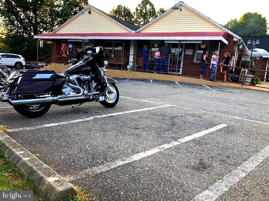 Money maker restaurant, bar, and liquor store. Center of community. Beloved food, bar, neighbors. Daily average traffic on the road 18,000 cars per day. 4.5 acres of Land. 1 Generator. 3 walk-in coolers. 2 walk-in freezers. SDE is $350,000 per year.