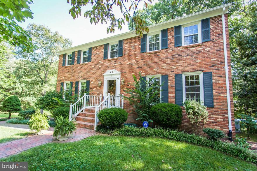 Elegant All Brick Home W/ 4 BR. Stunning New Kitchen Featuring Island & Stainless Appliances, Dbl Ovens, Custom Pantry,Granite Countertops & 3 Brick Fire Places. Hard Wood Floors & Plantation Shutters Create Perfection. Living Room W/ Brick Fireplace & French Doors Onto Deck for Entertaining. Partial Finished Walk Out Basement W/ Fireplace & French Doors Onto Patio.  CHANDELIER DOES NOT CONVEY.